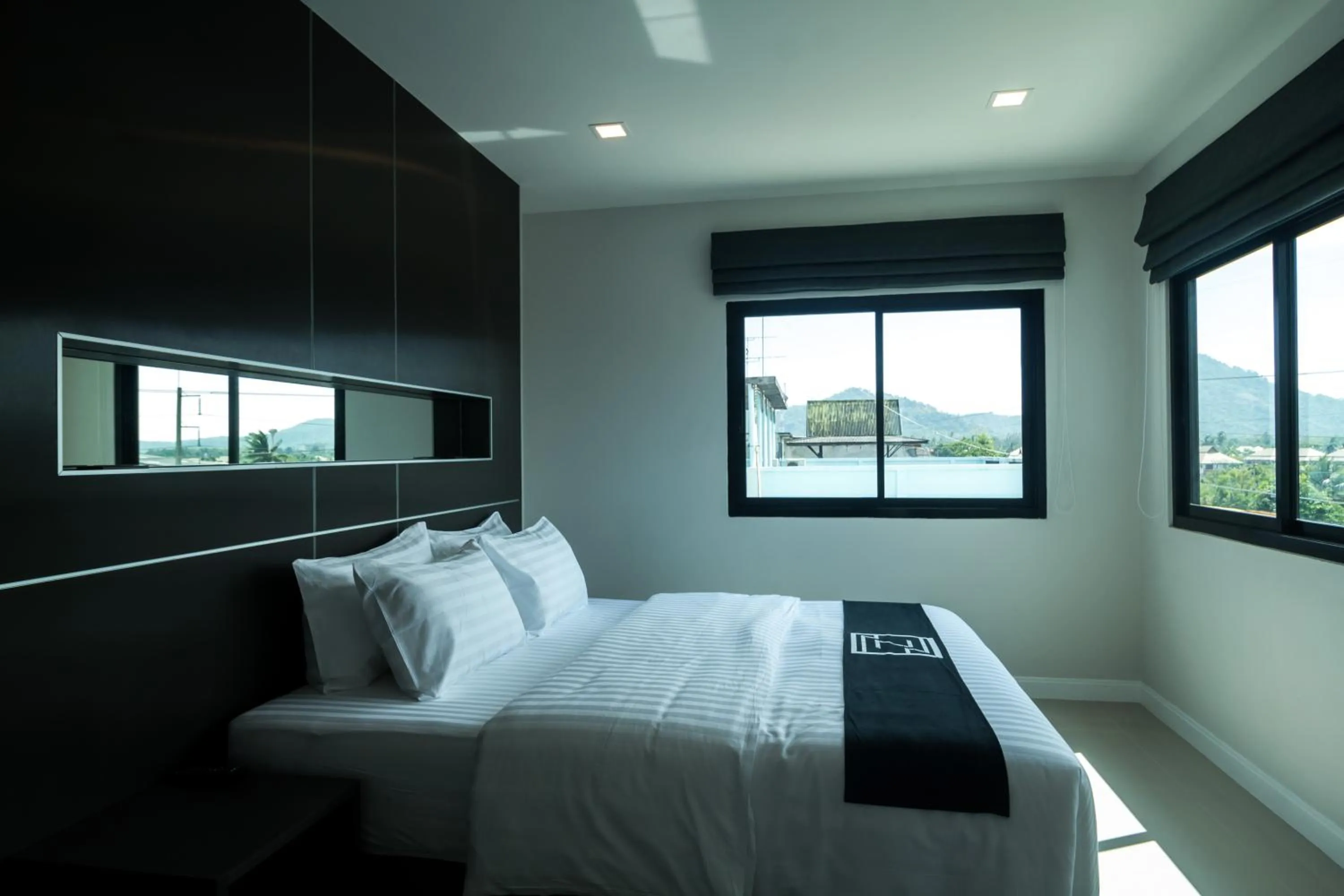 Bed in Triple Z Hotel