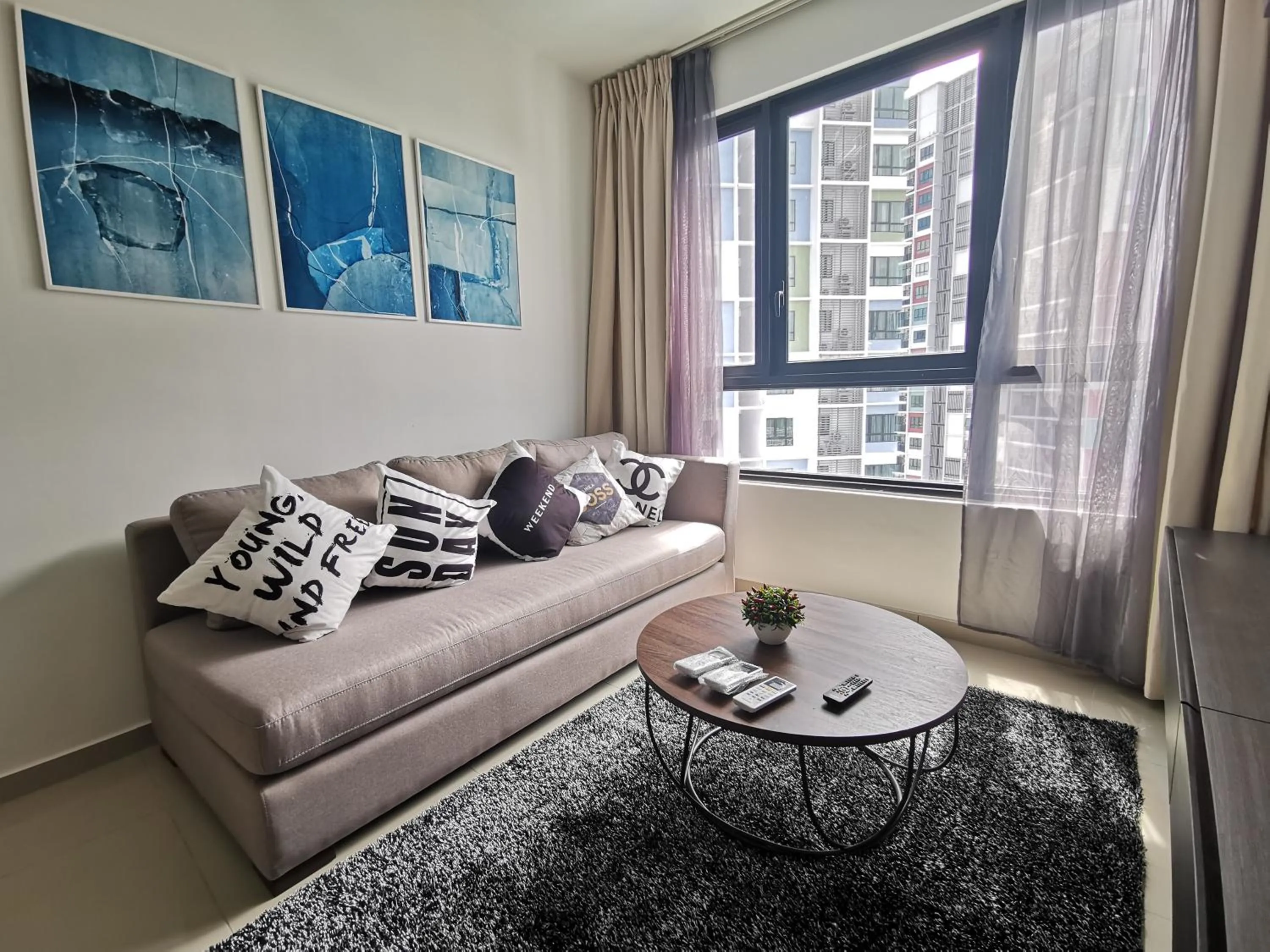 Living room in Host Assist Homestay by HA i-City