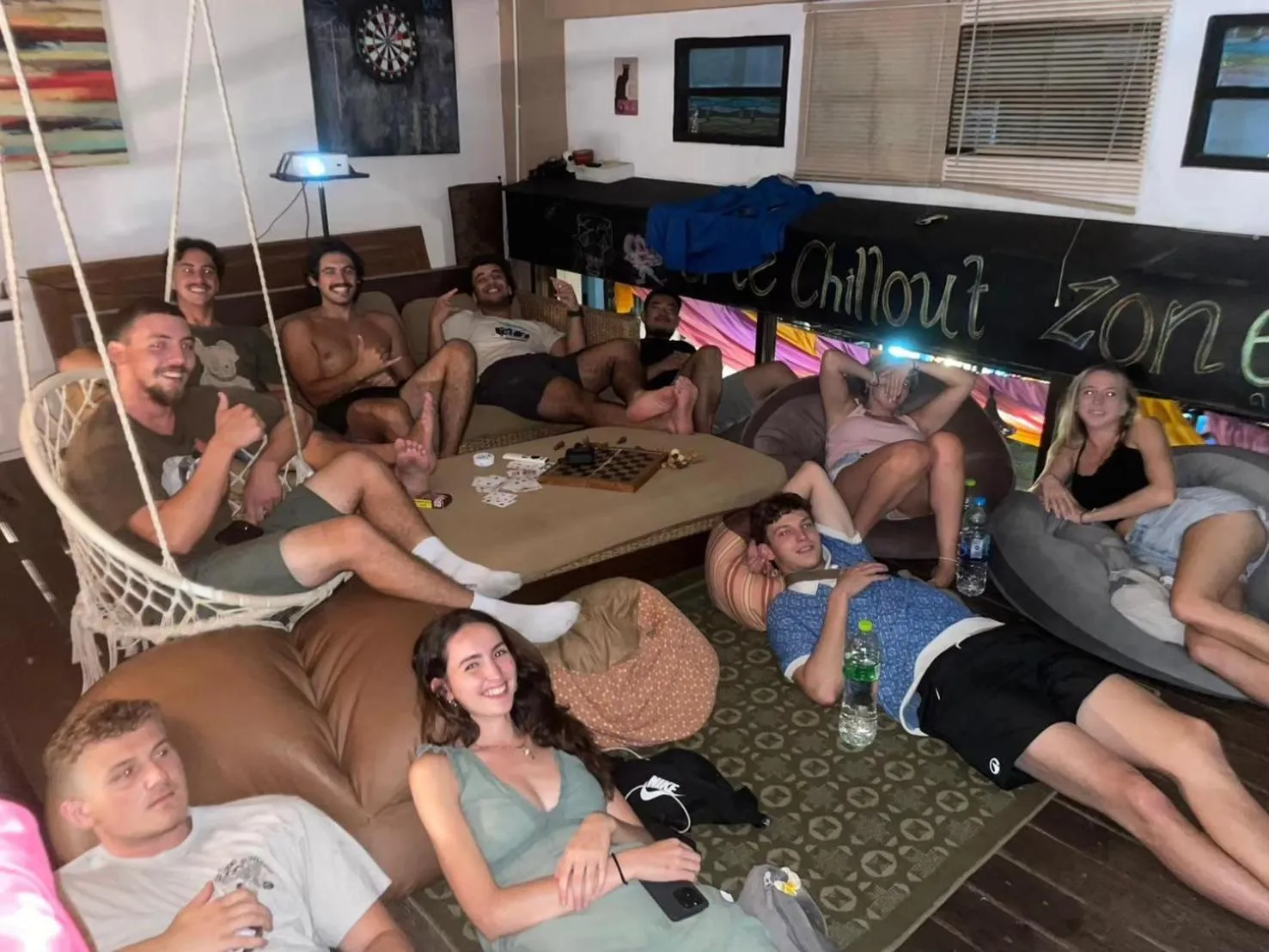 Communal lounge/ TV room in The Cabin Backpackers Hostel & Bar