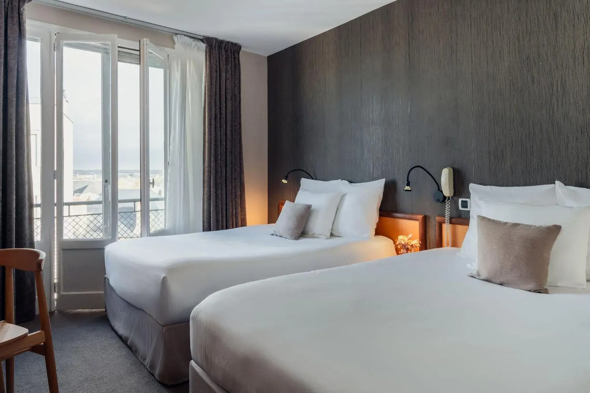 Classic Quadruple Room - single occupancy in Hotel Des Lices, Rennes Centre Classic Quadruple Room - single occupancy in Hotel Des Lices, Rennes Centre