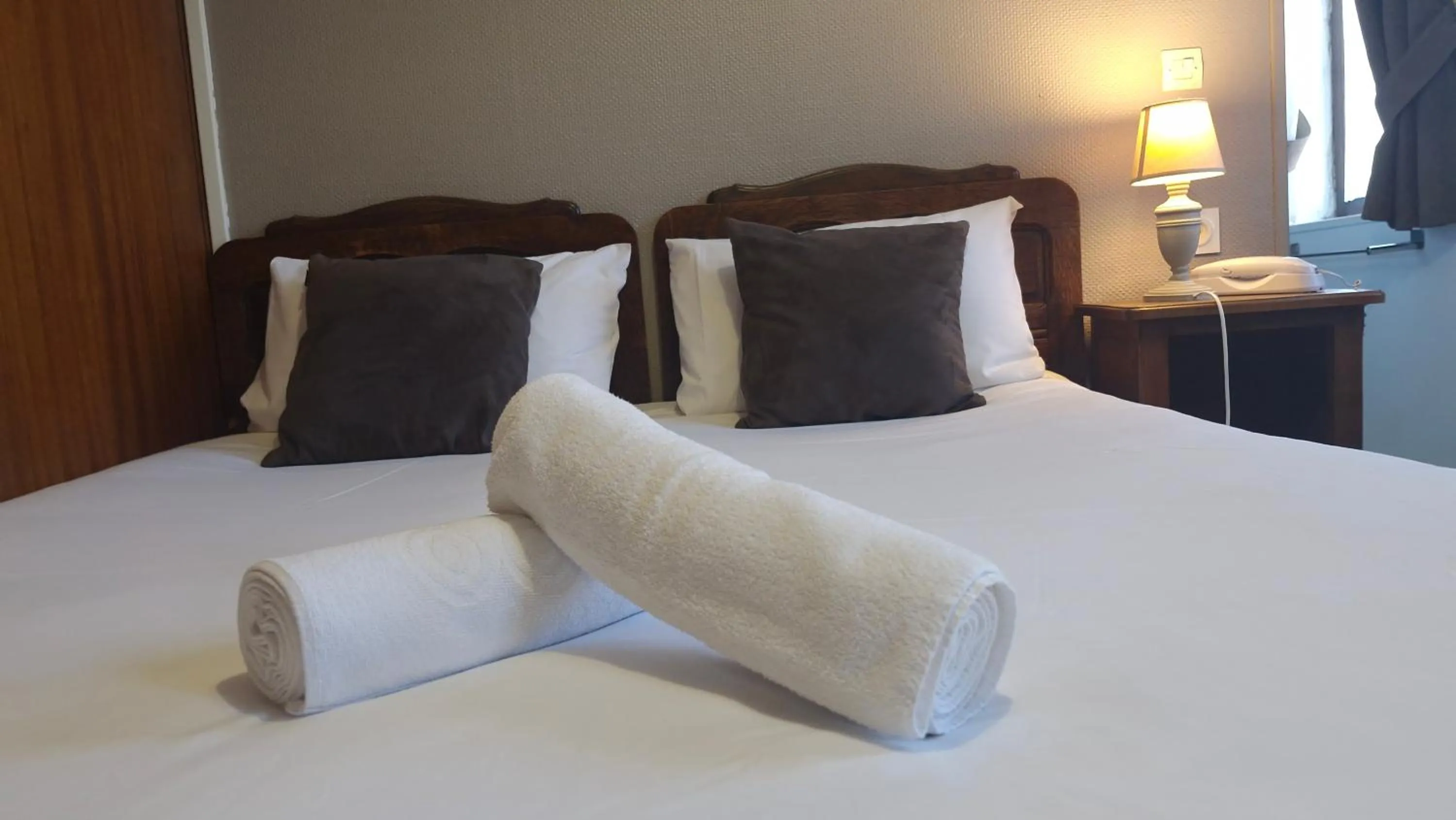 Bed in Hotel Saint Etienne