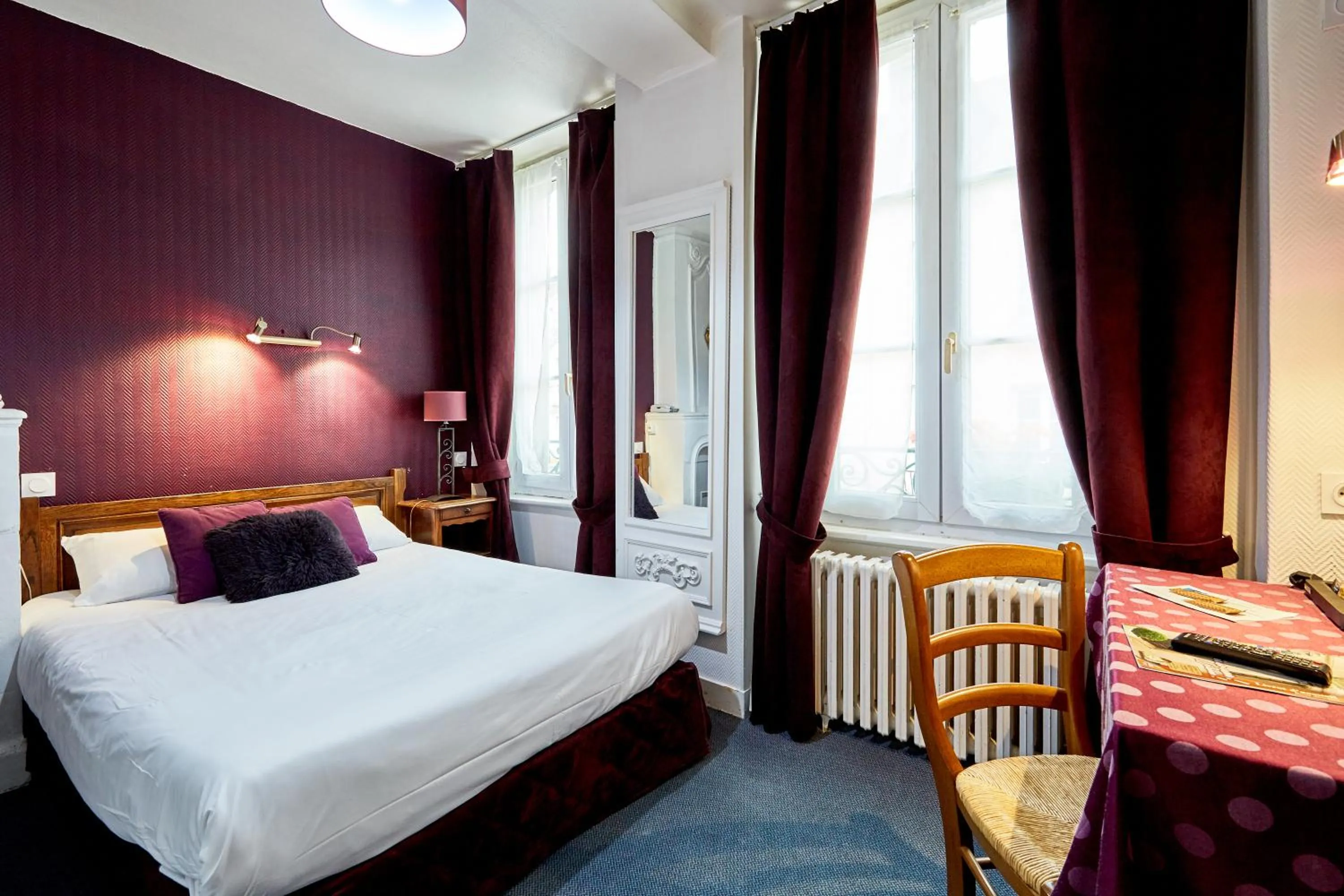 Photo of the whole room, Bed in Hotel Saint Etienne