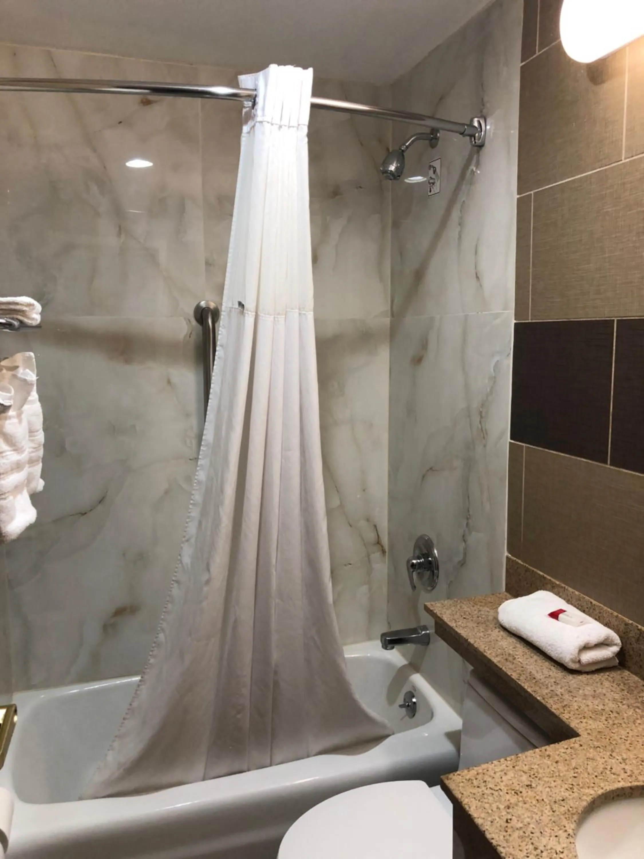 Bathroom in Days Inn by Wyndham Brooklyn