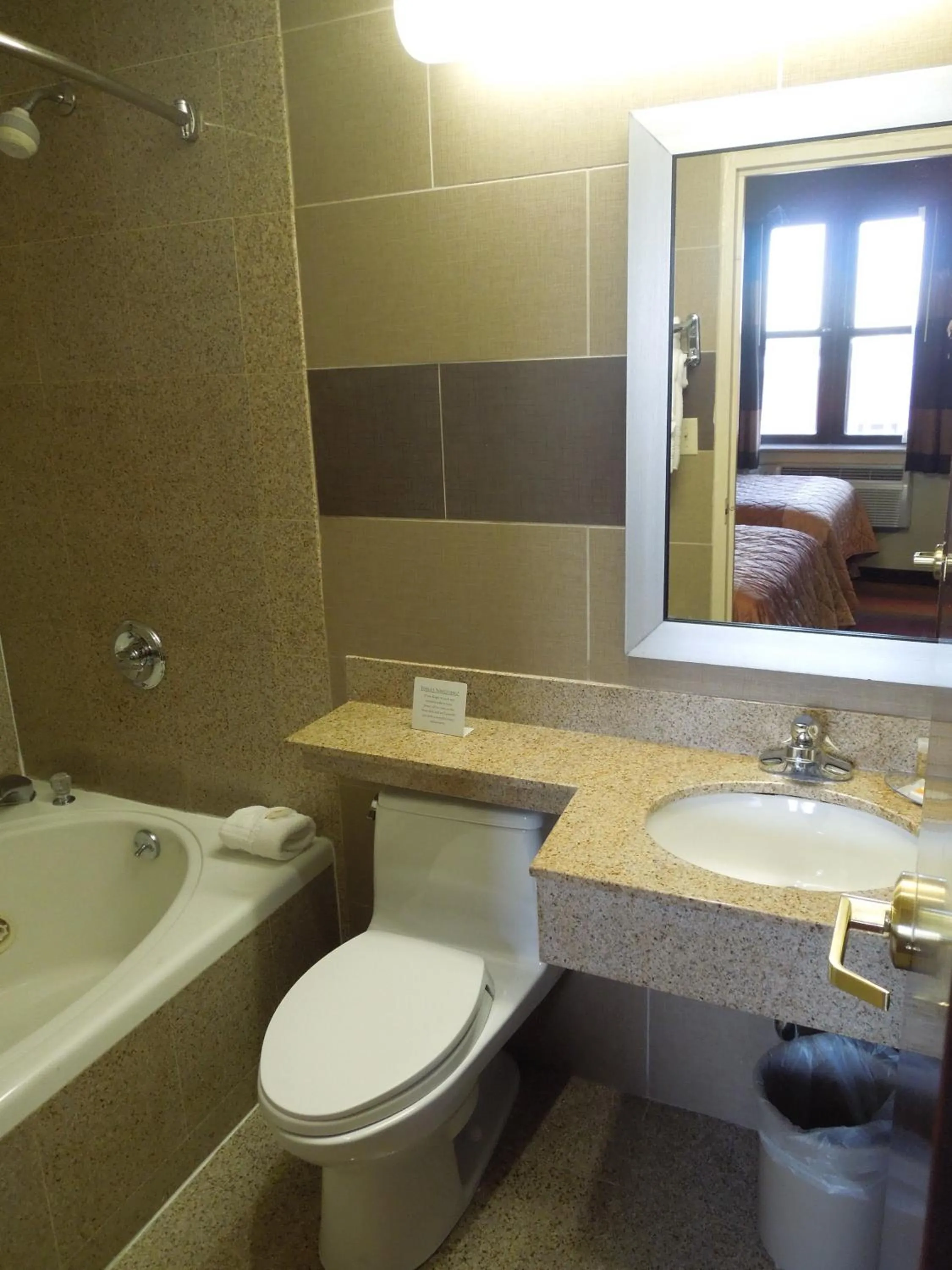 Bathroom in Days Inn by Wyndham Brooklyn