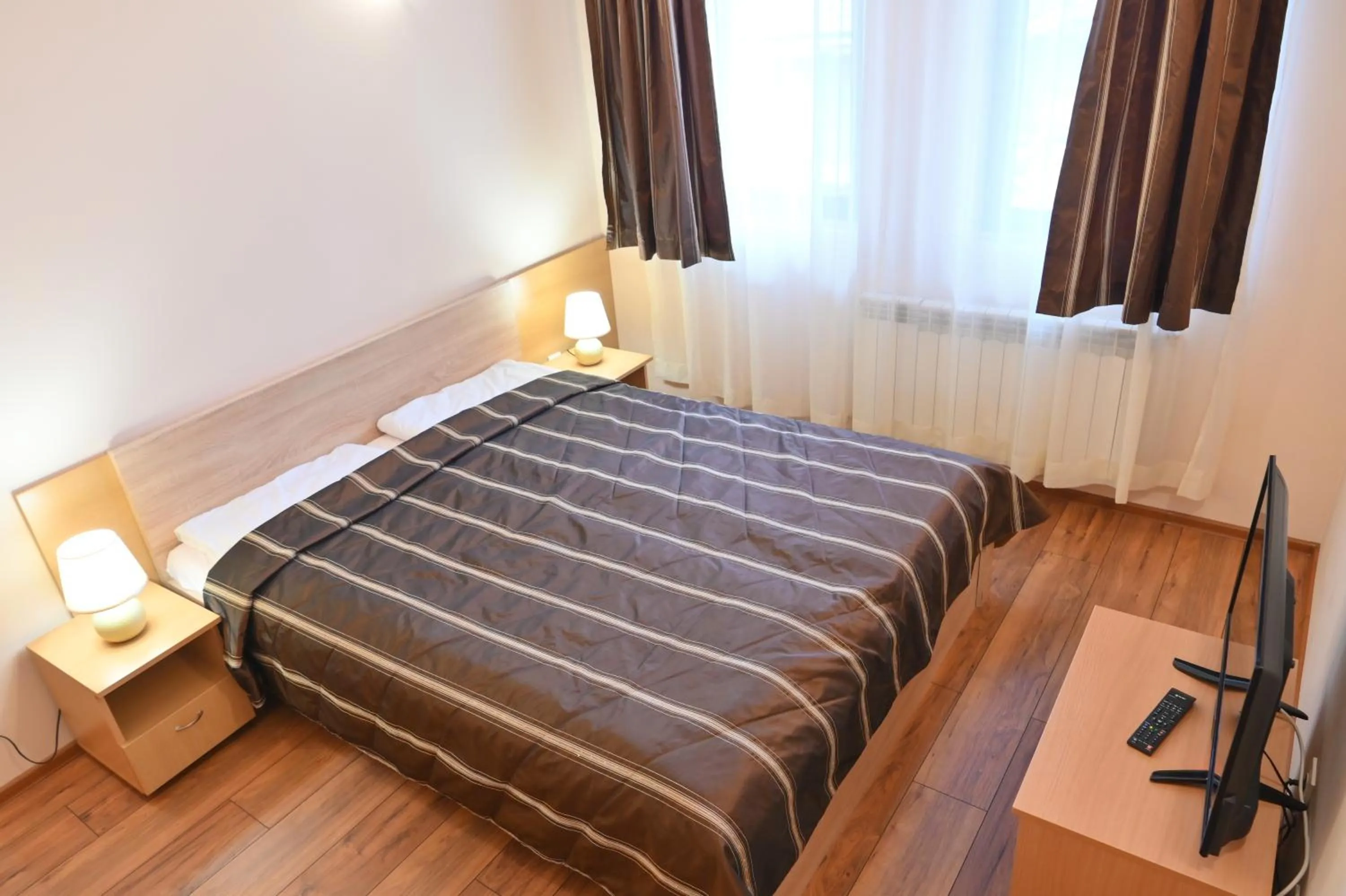 Bed in Apart Hotel Orbilux