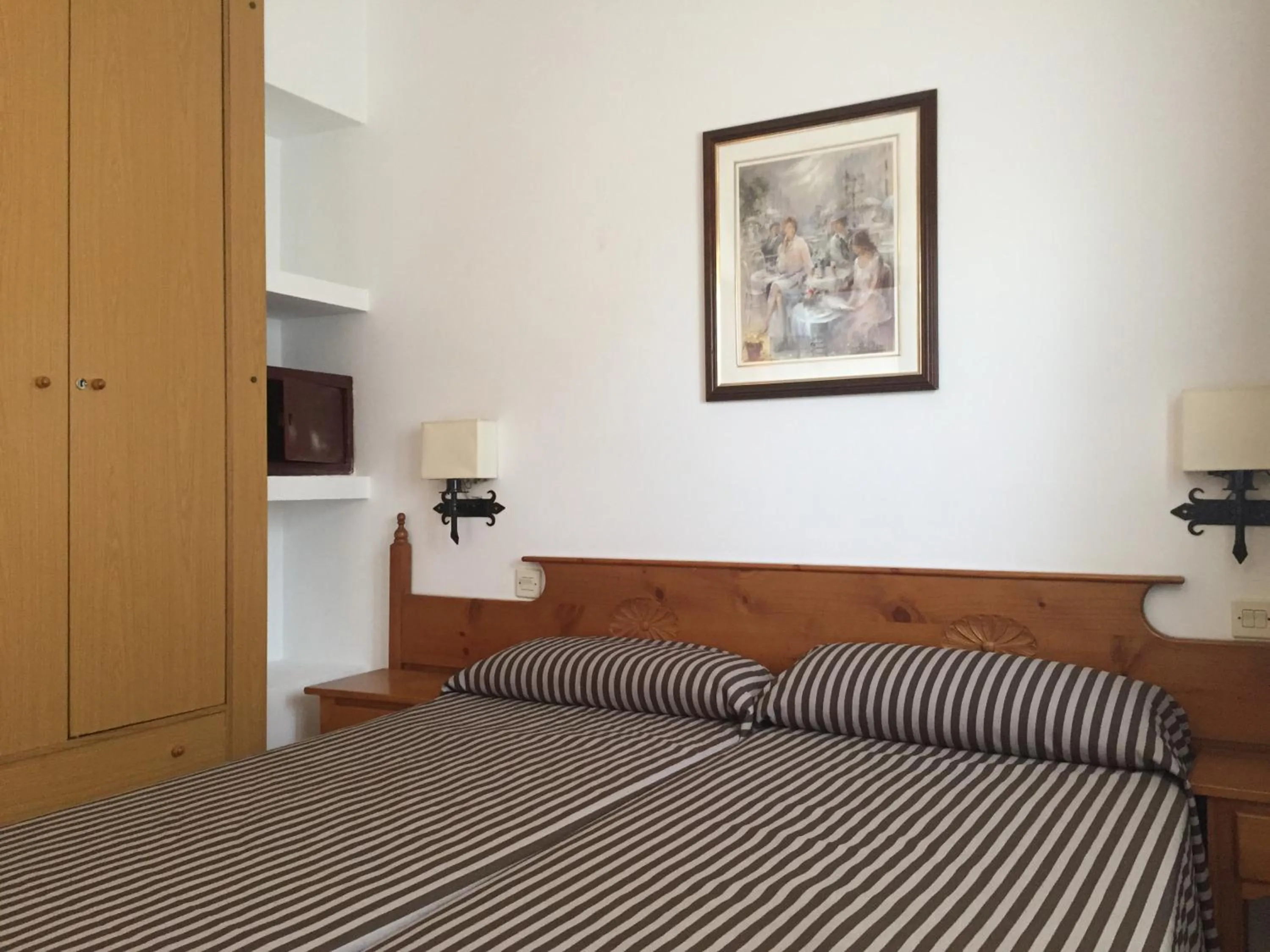 Photo of the whole room, Bed in Apartamentos Santi