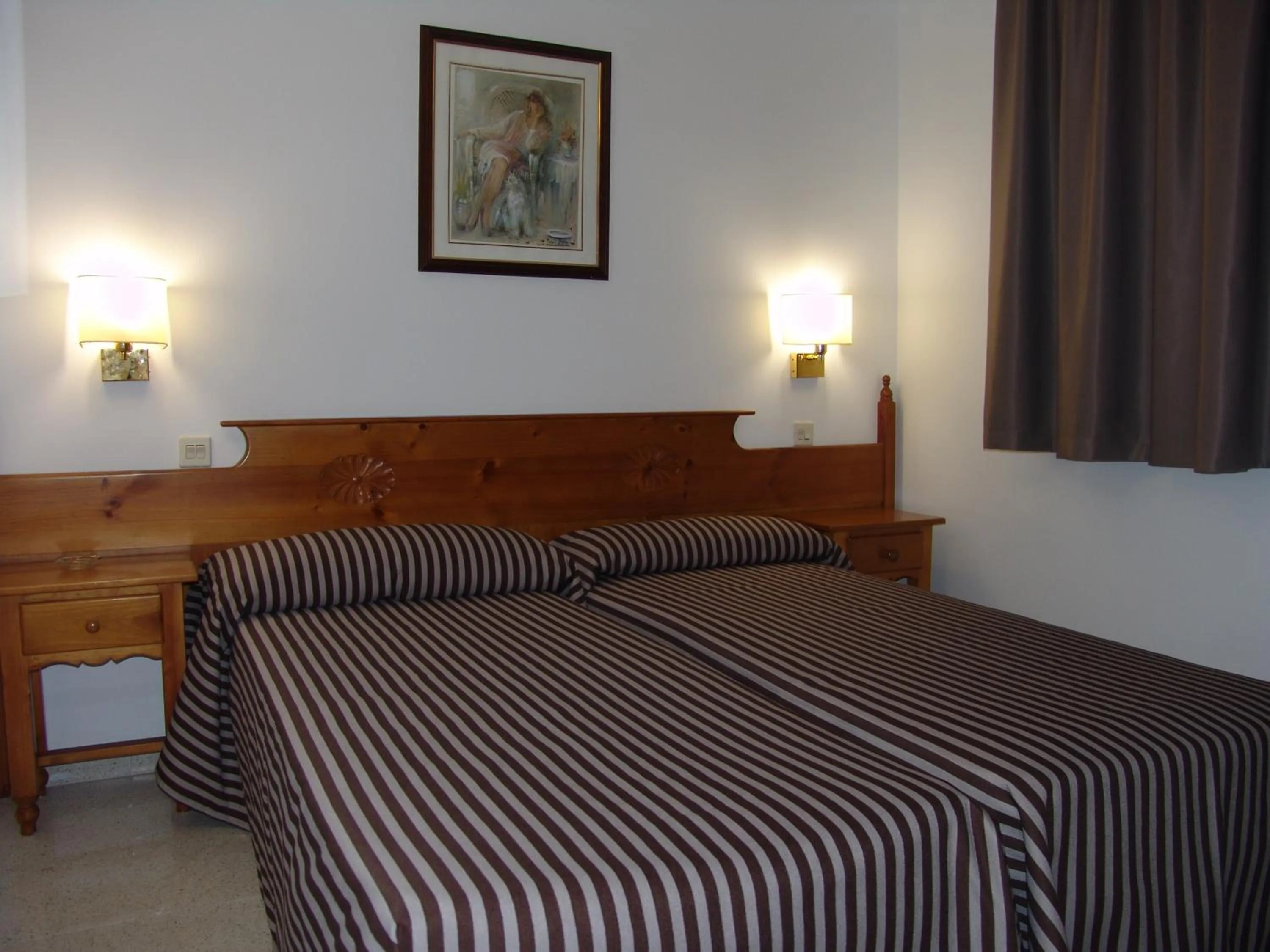 Bedroom, Bed in Apartamentos Santi