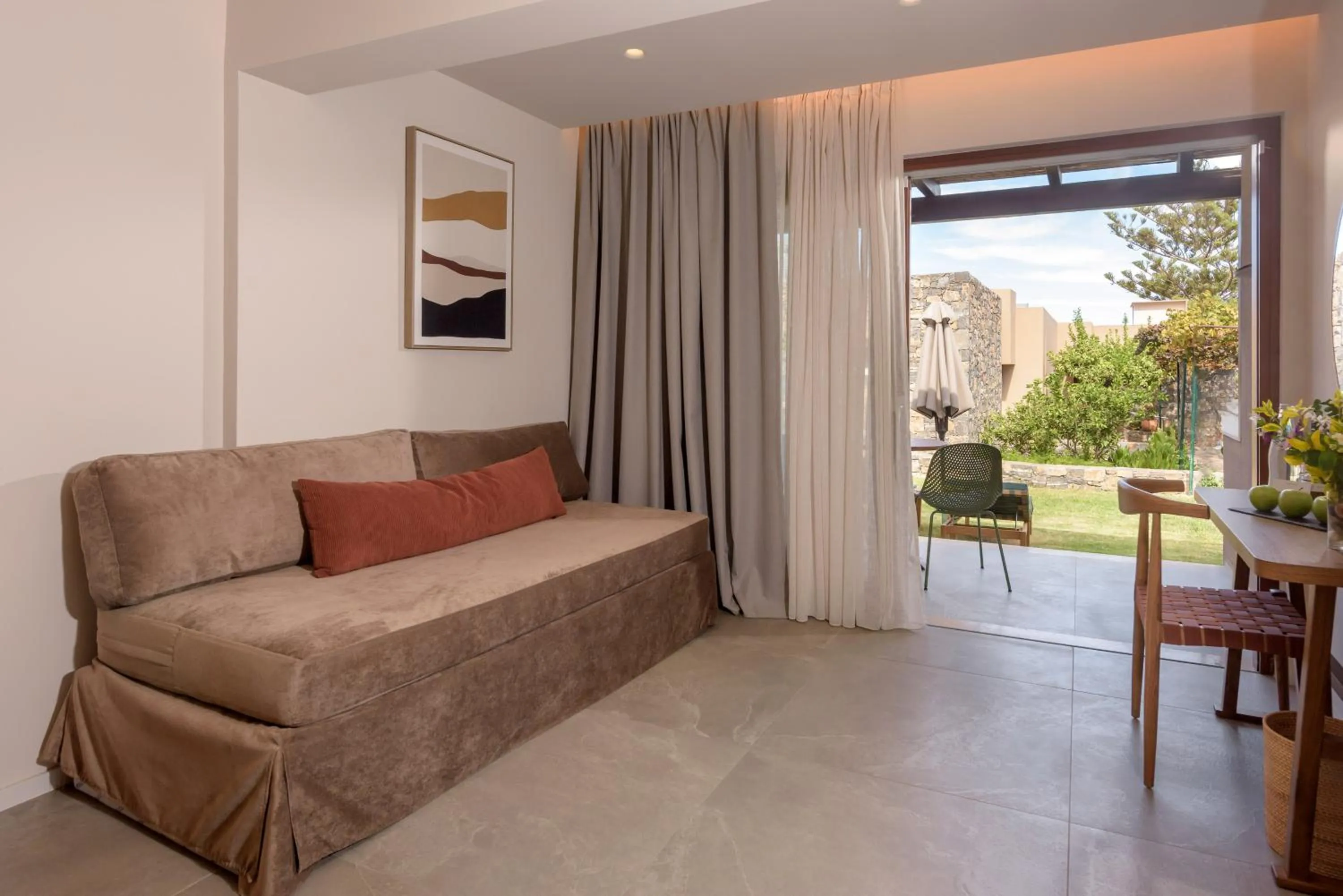 Living room in Blue Sea Beach Affiliated By Melia