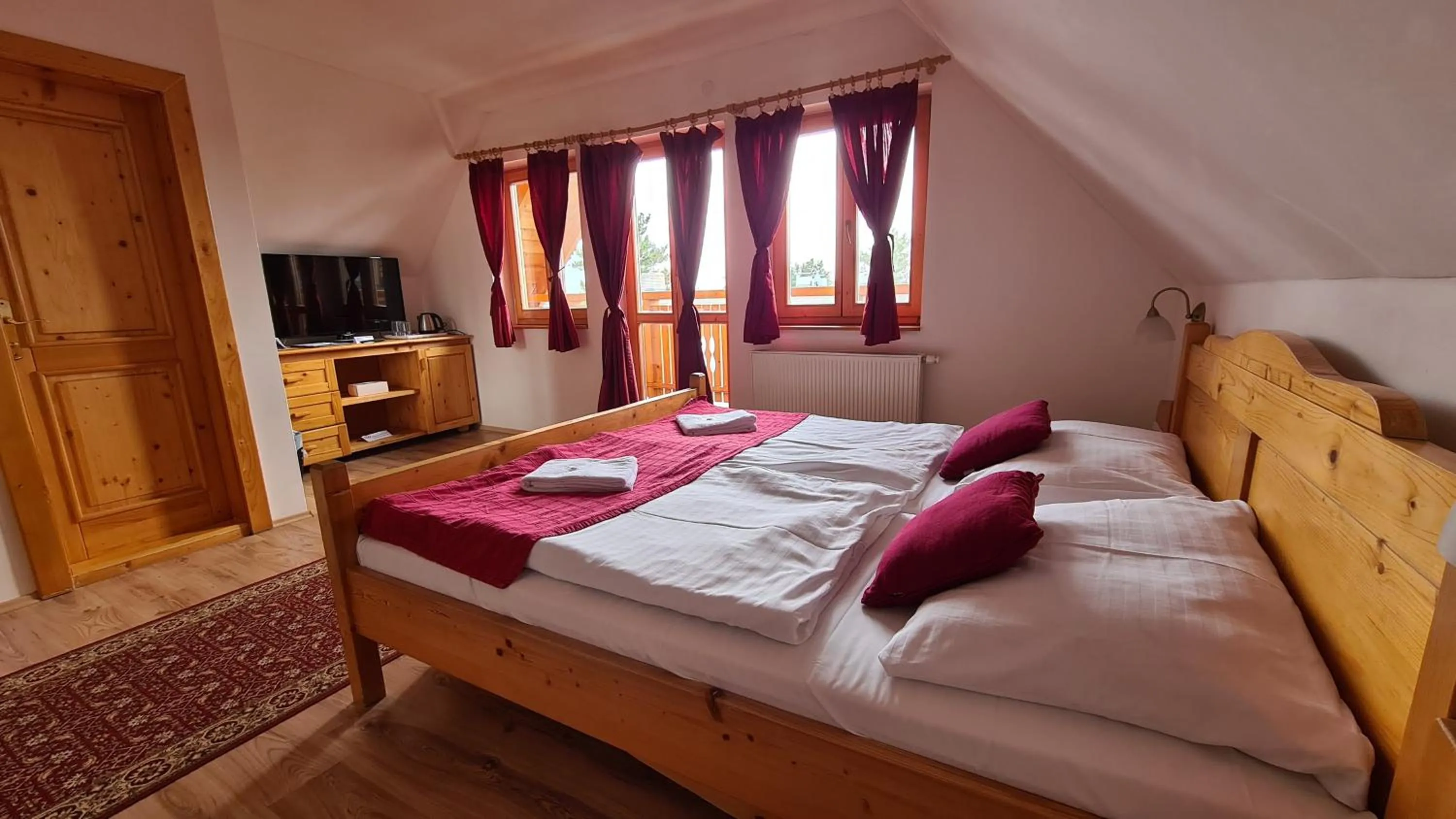 Bathroom, Bed in Hotel Koliba