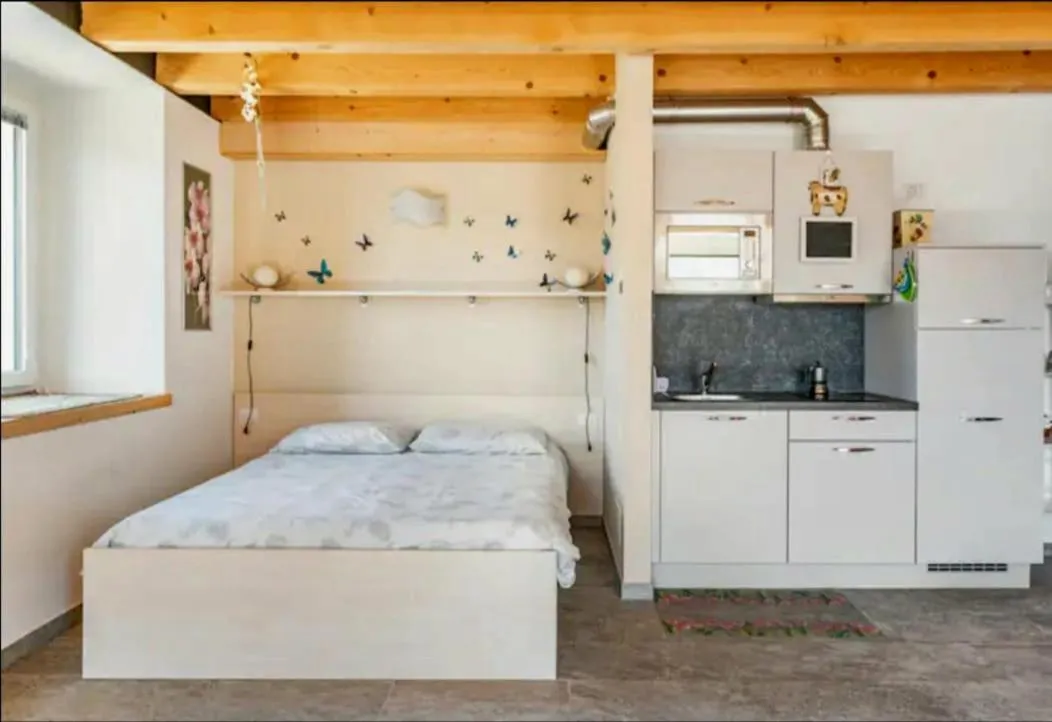 Bed in Foresteria B&B Vecchiascuola Pianazzola