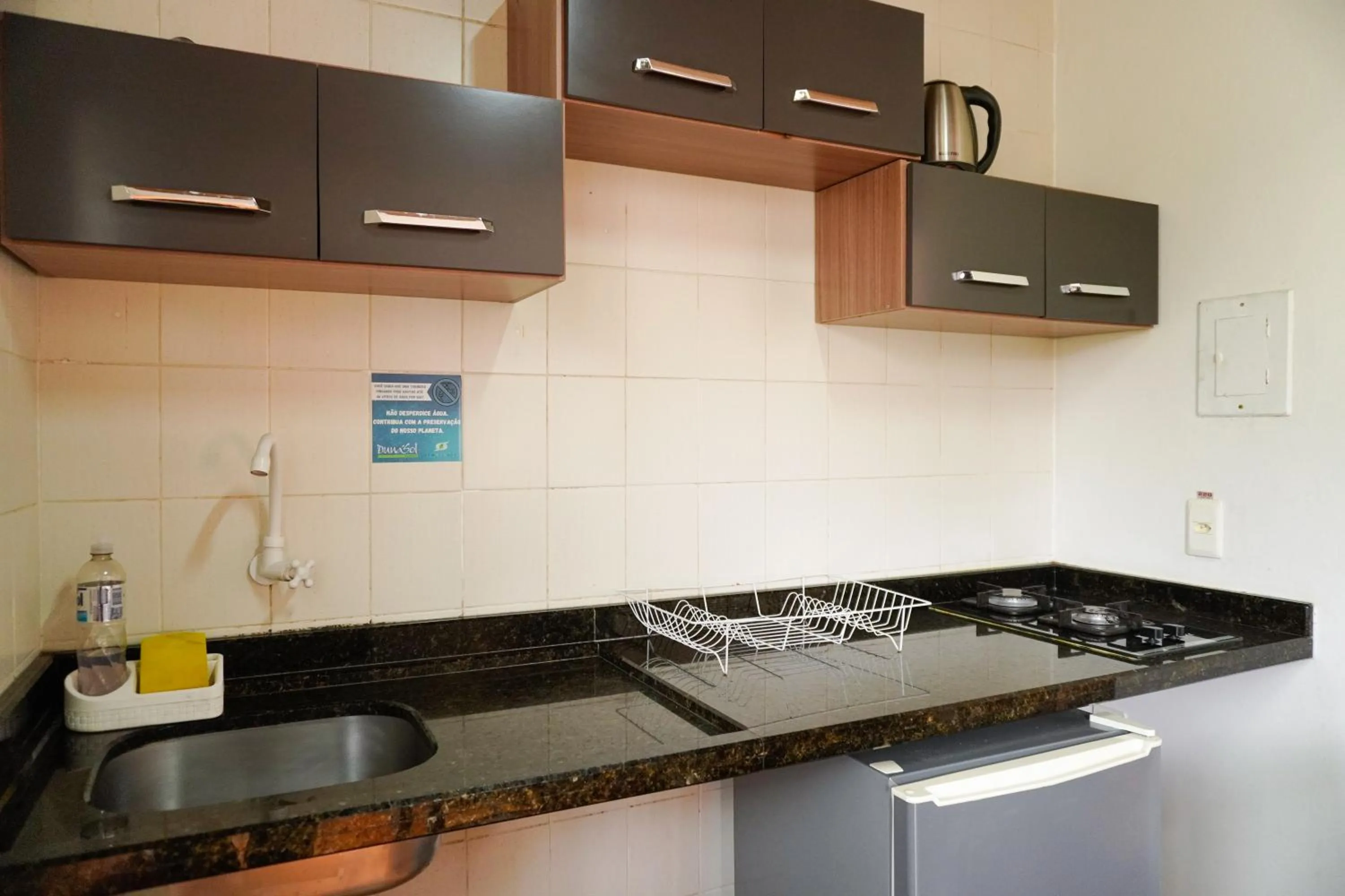 Kitchen or kitchenette in Pousada Dunasol Floripa