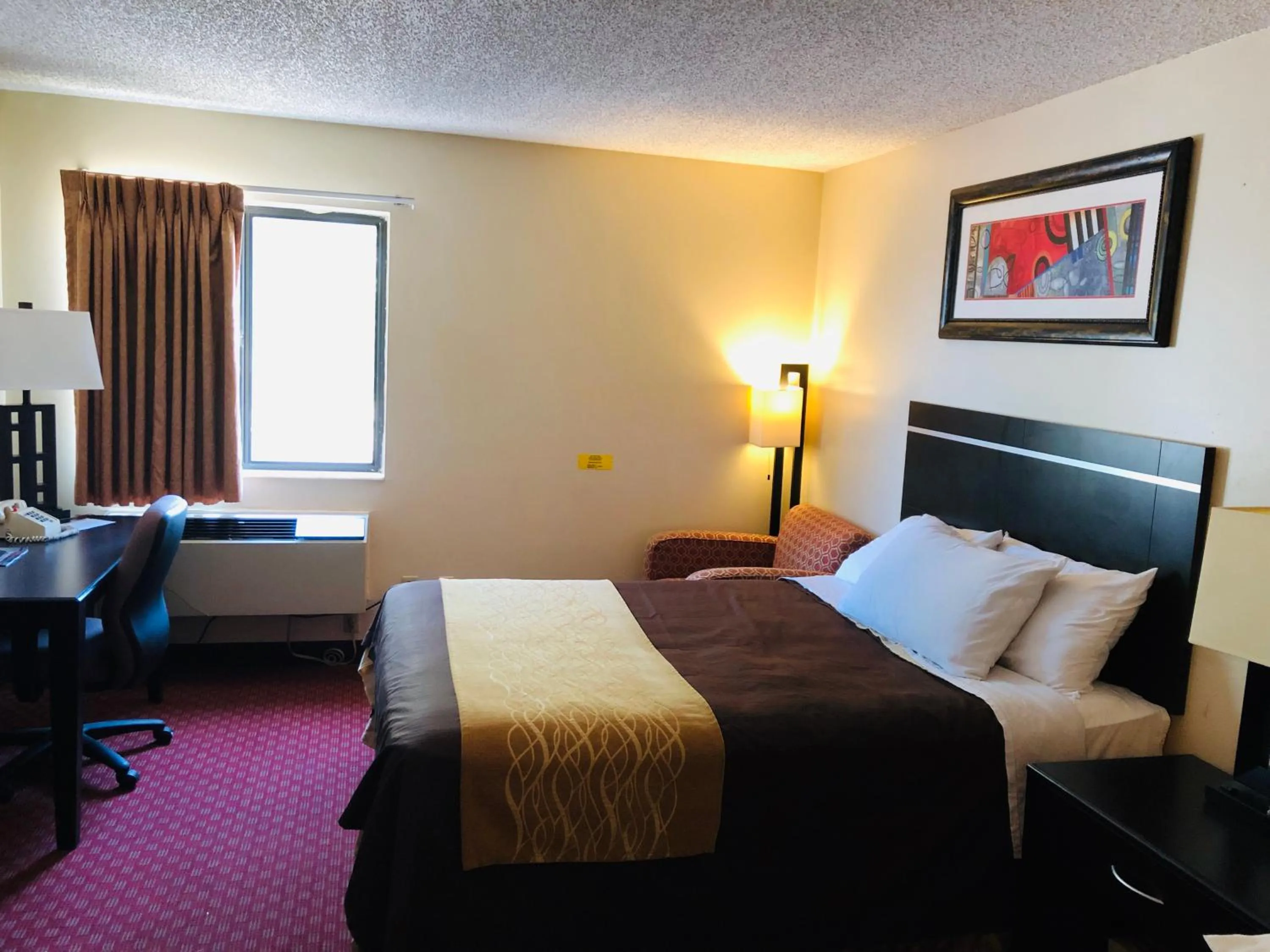 Bed in Super 8 by Wyndham Omaha SW