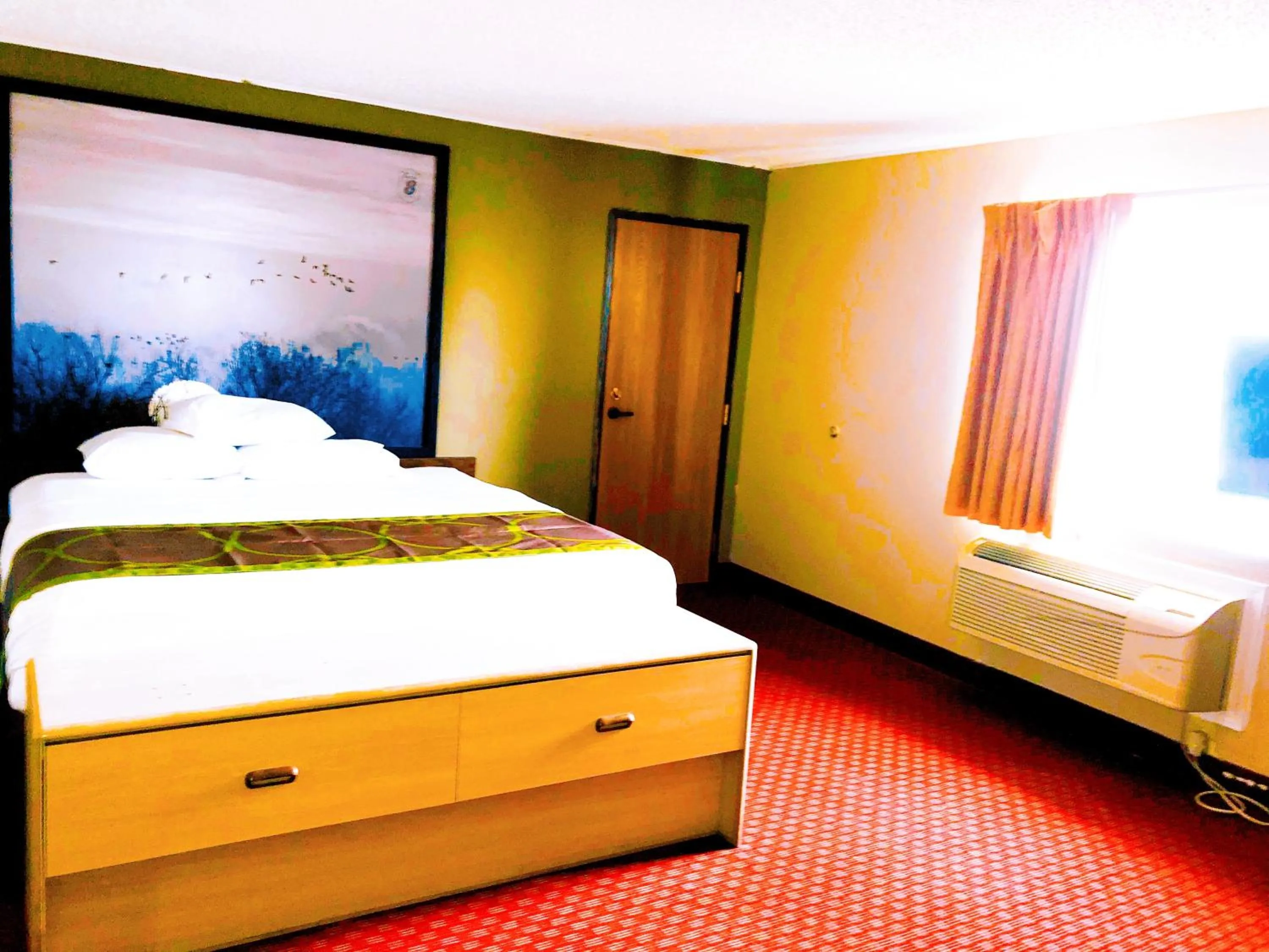 Bed in Super 8 by Wyndham Omaha SW