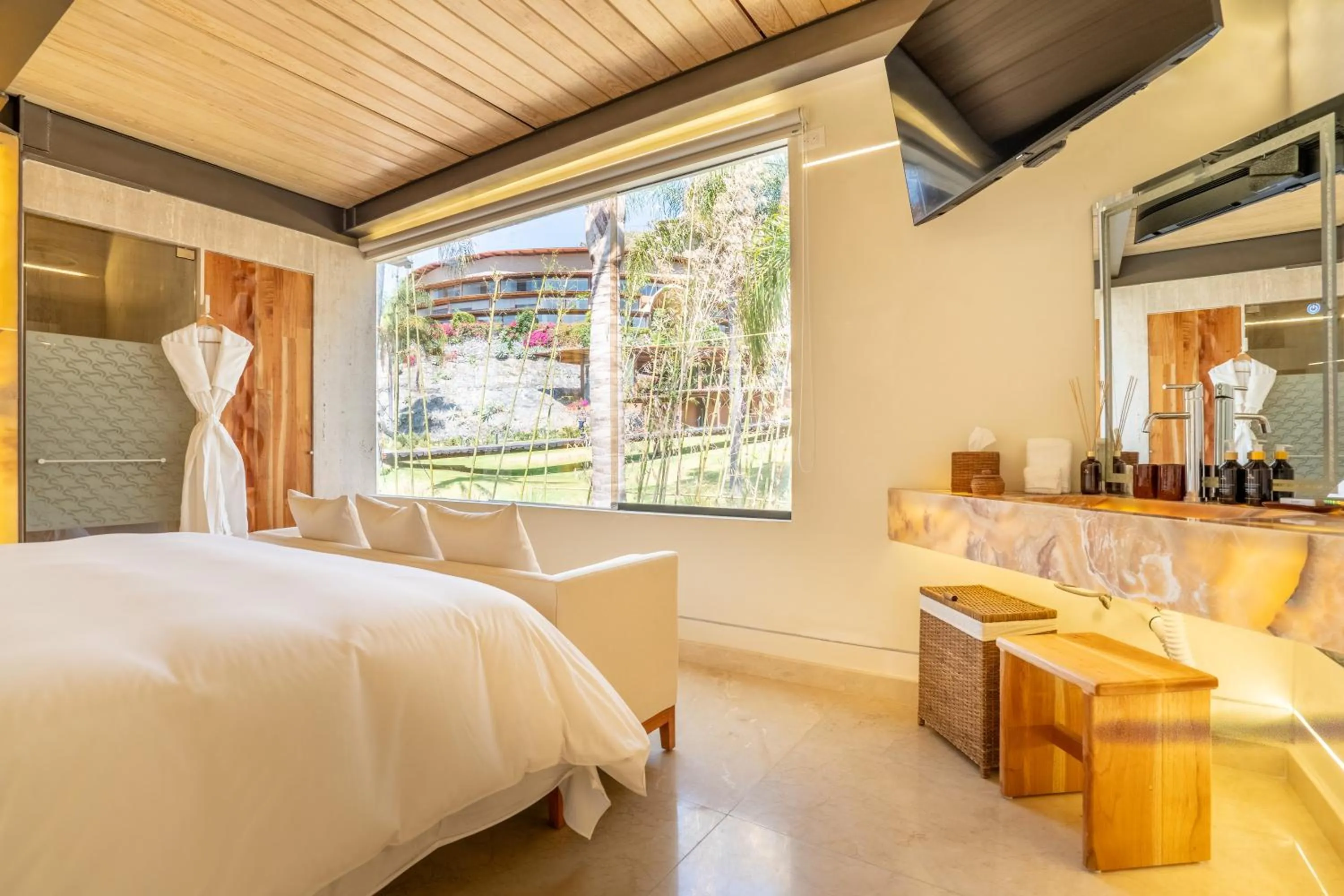 Bedroom, Bed in El Santuario Resort & Spa