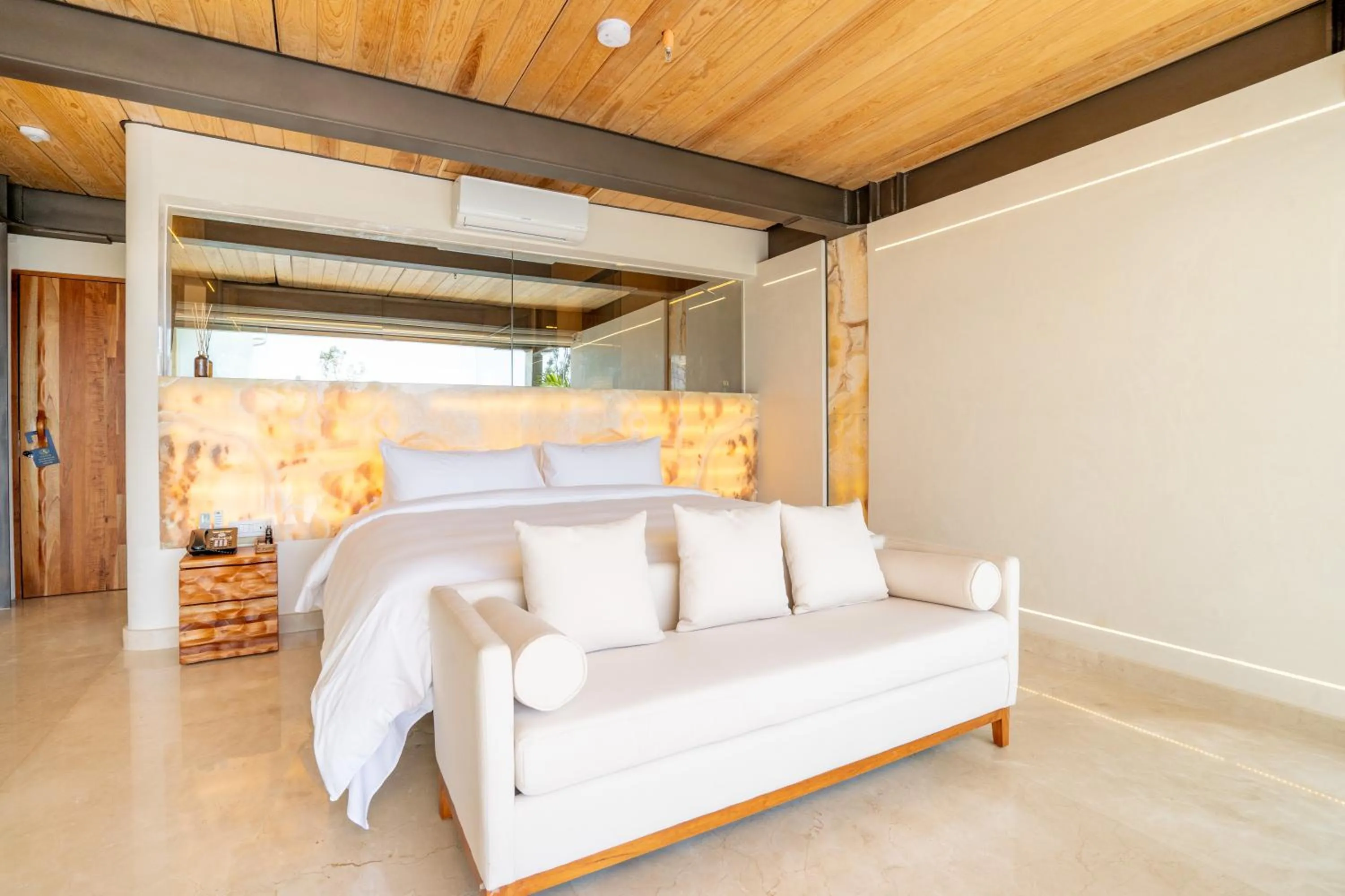 Bed in El Santuario Resort & Spa