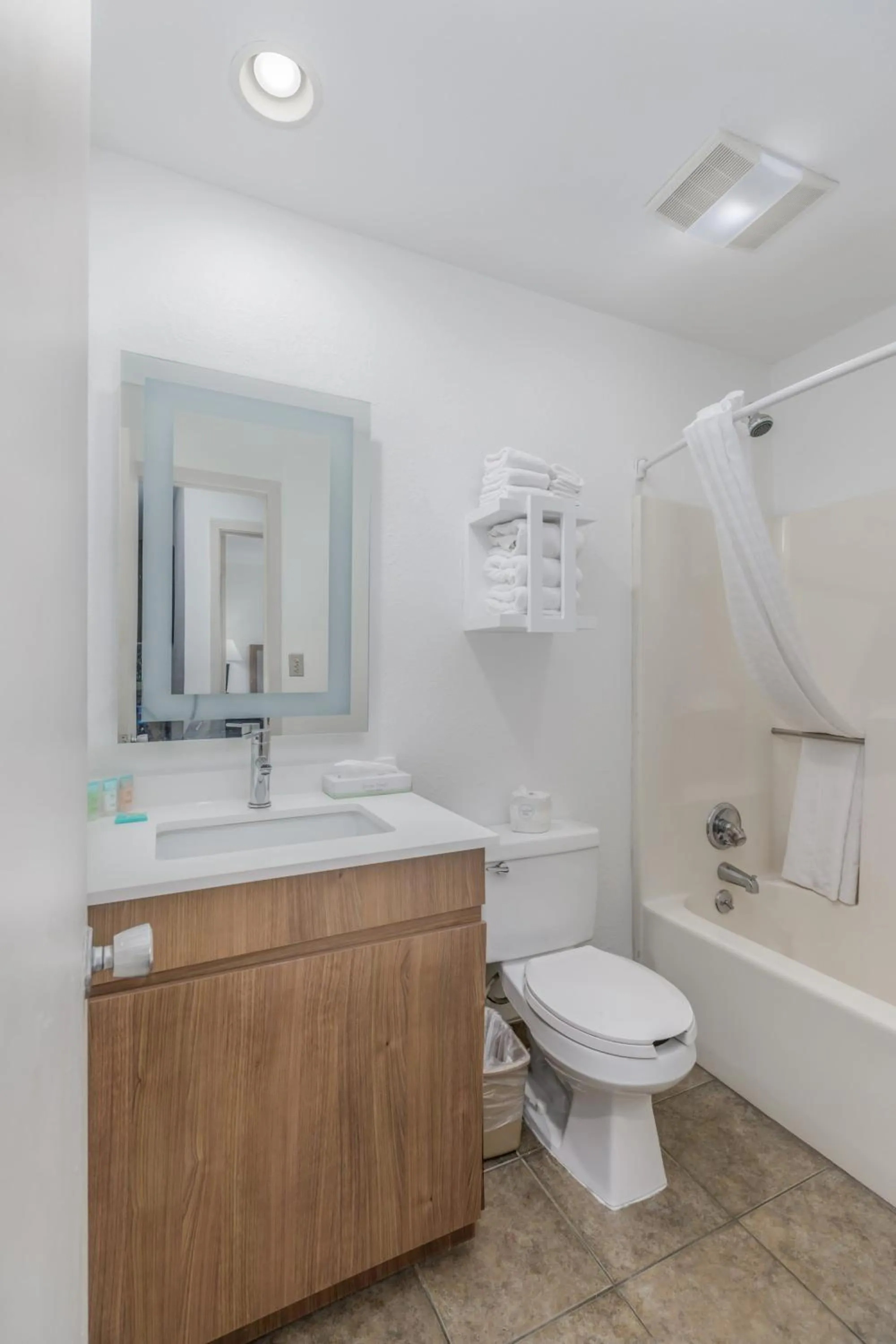 Shower in Crossroads Inn & Suites