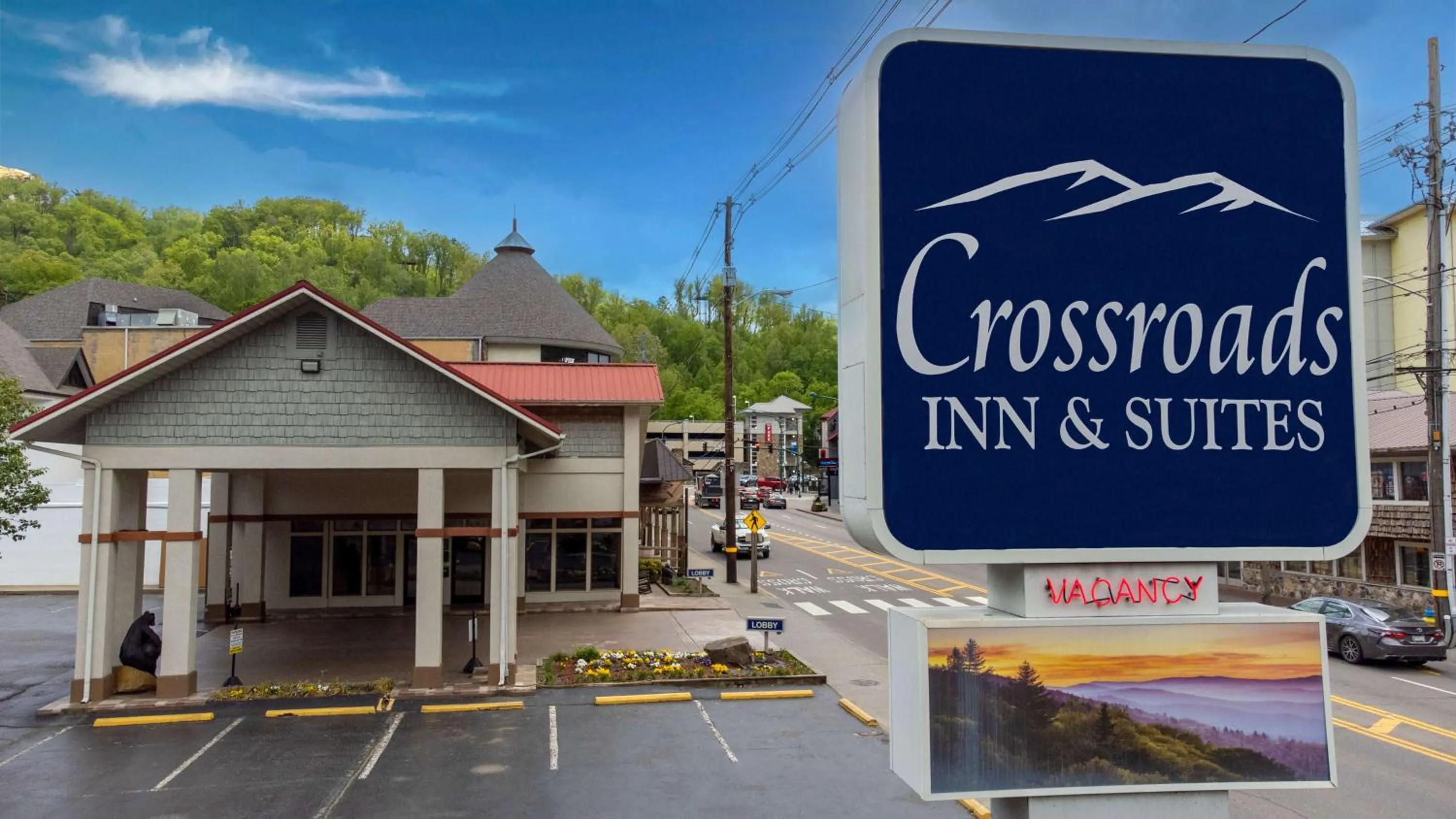 Property logo or sign in Crossroads Inn & Suites