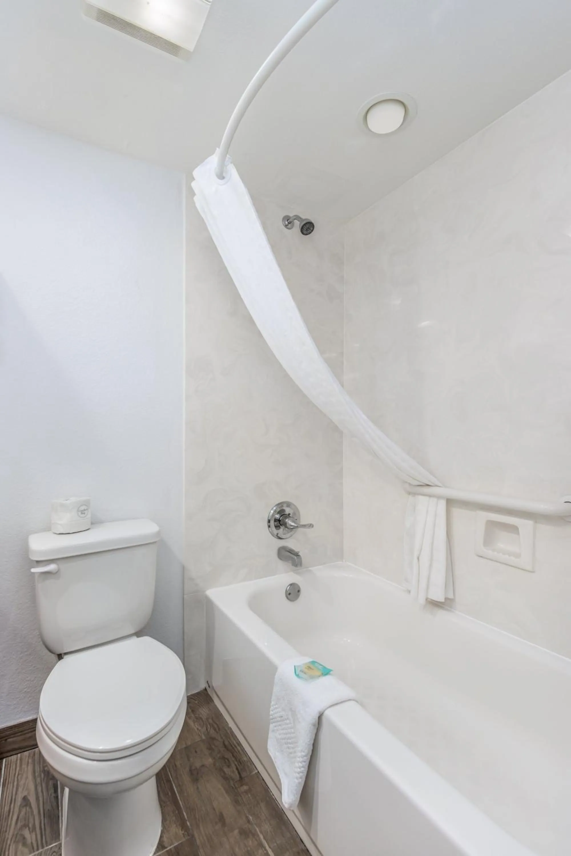 Shower in Crossroads Inn & Suites