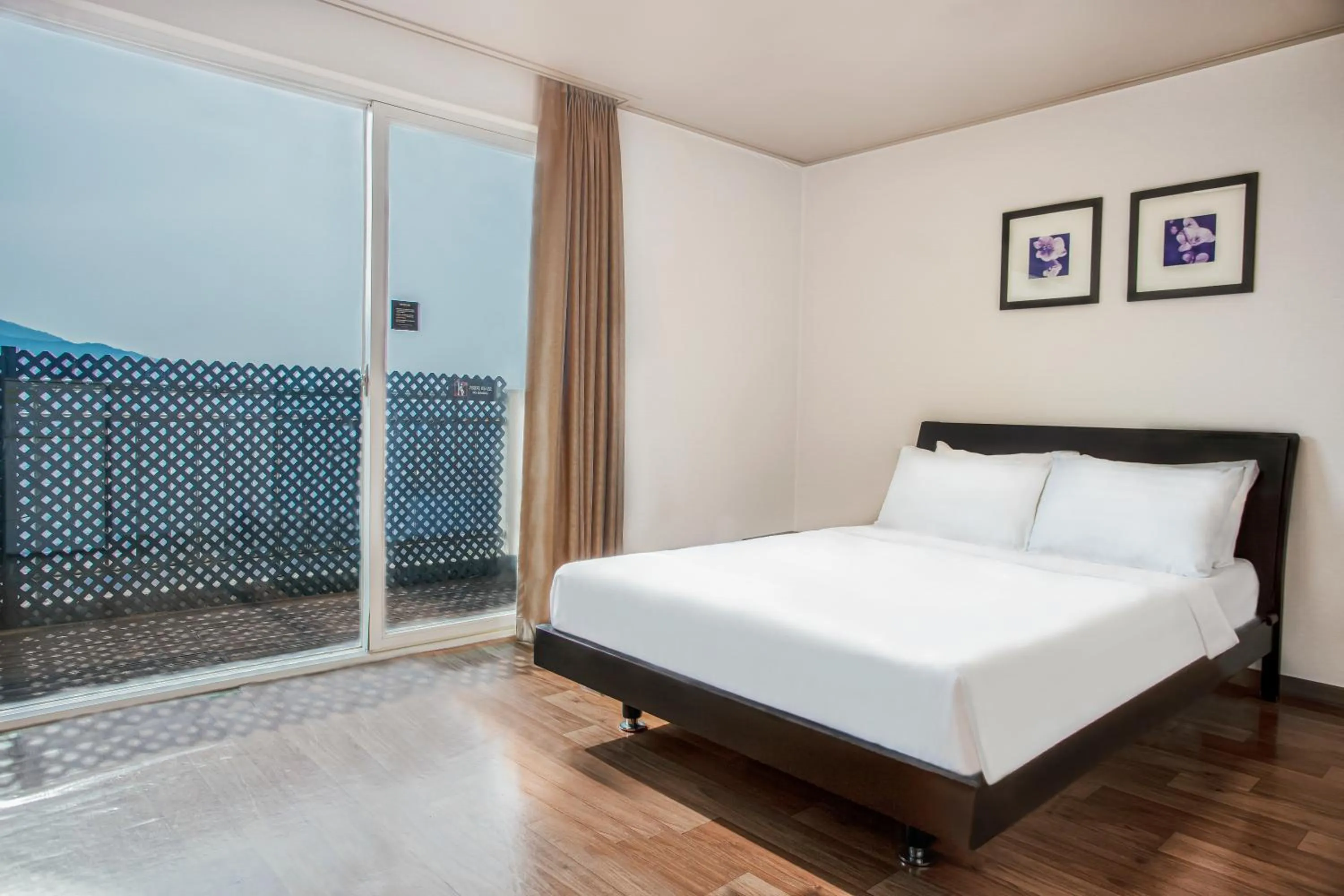 Bed in Kensington Resort Chungju