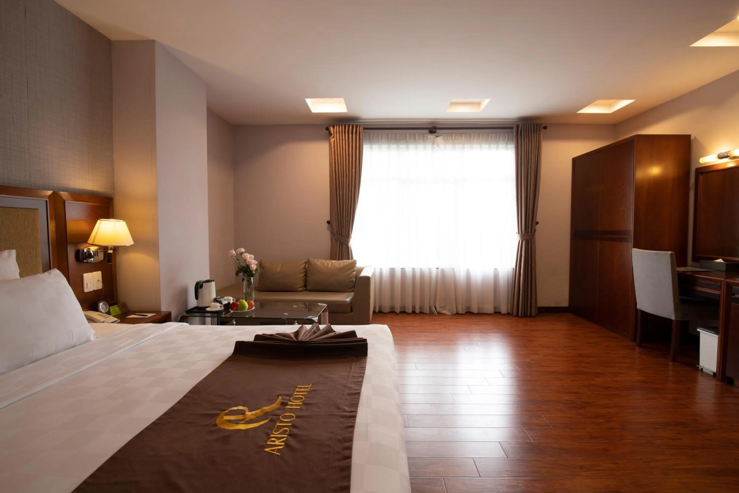 Bed in Aristo Saigon Hotel