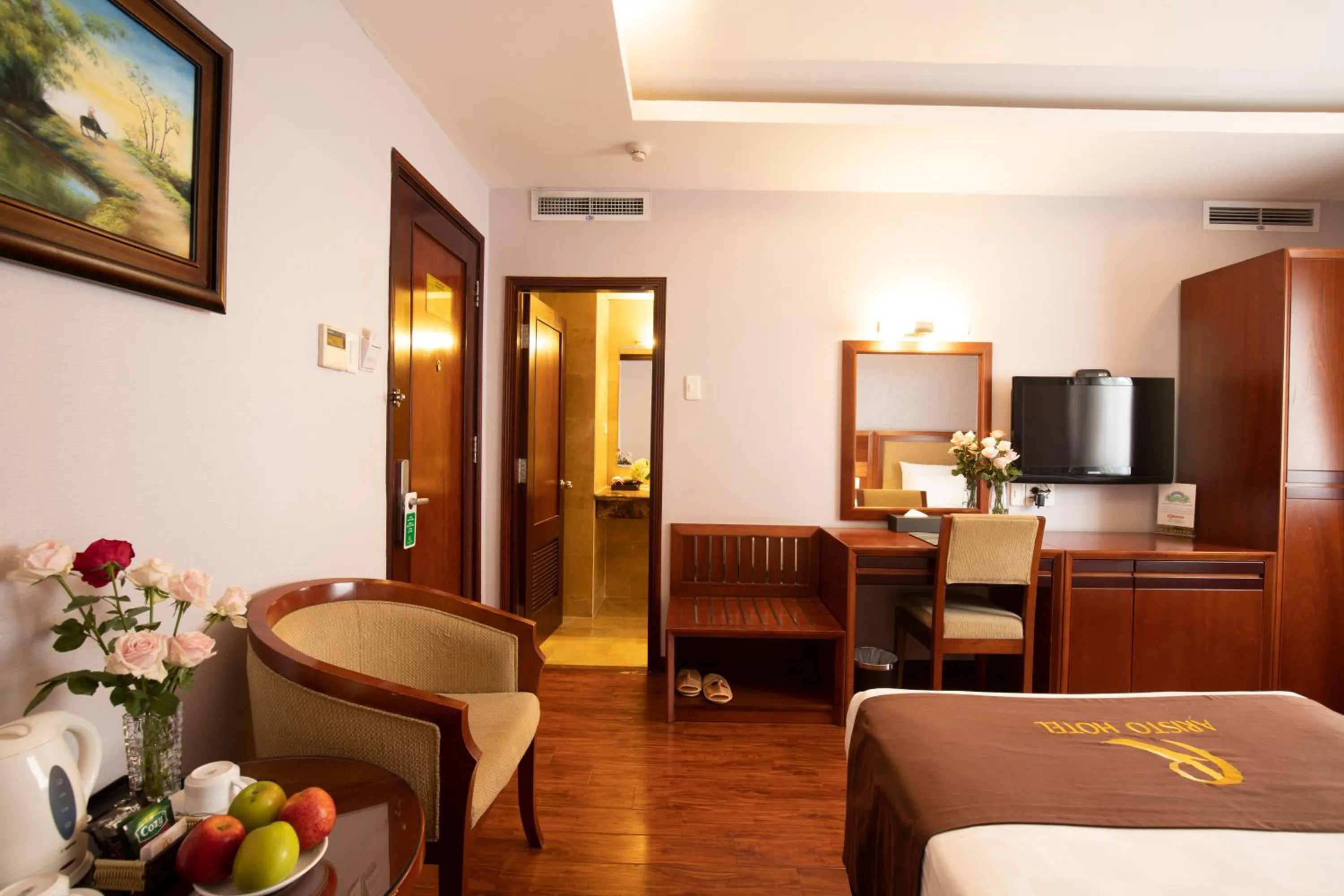 Seating area, Bed in Aristo Saigon Hotel