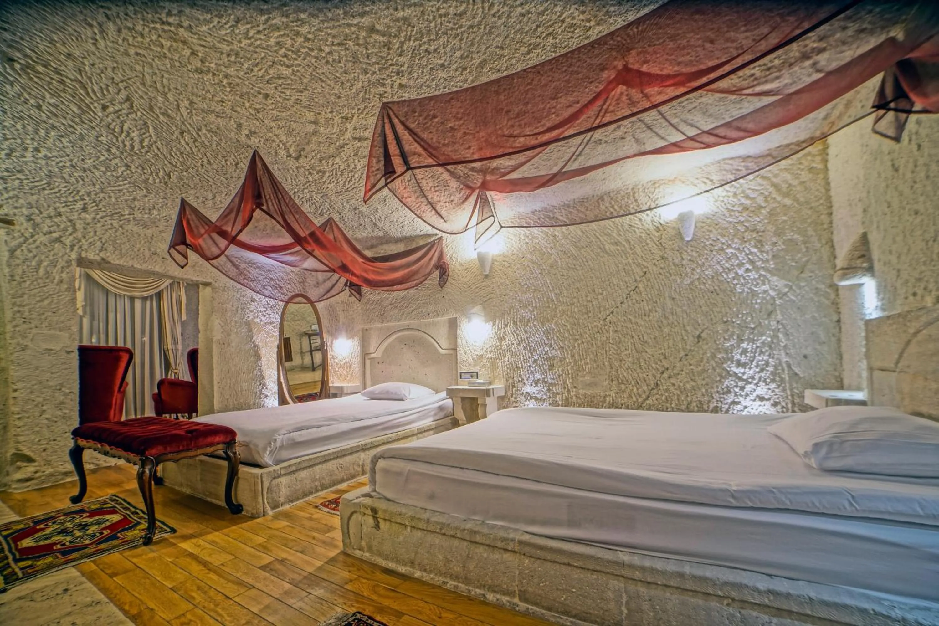 Bed in Anatolian Houses Cave Hotel & SPA