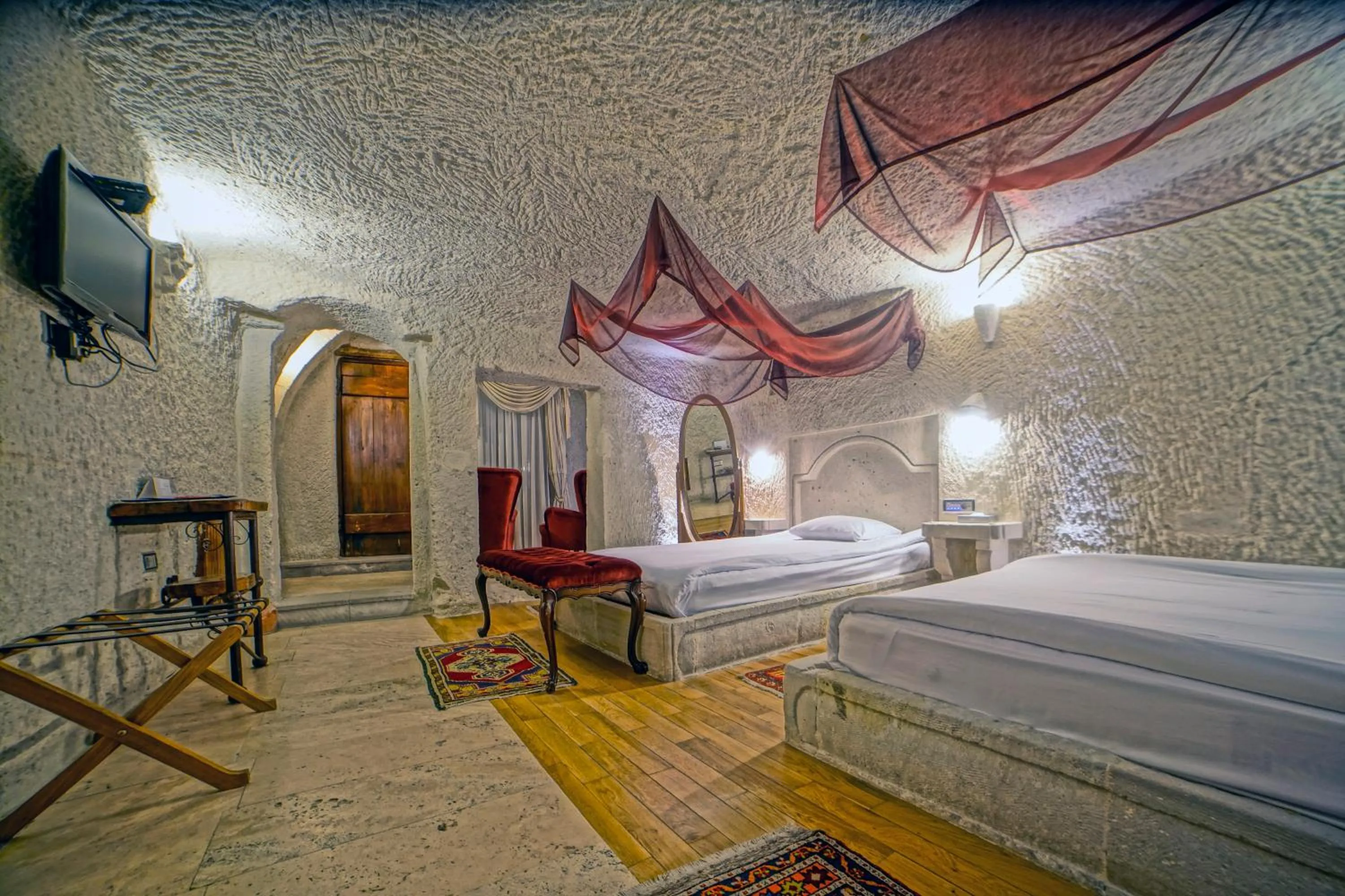 Bed in Anatolian Houses Cave Hotel & SPA