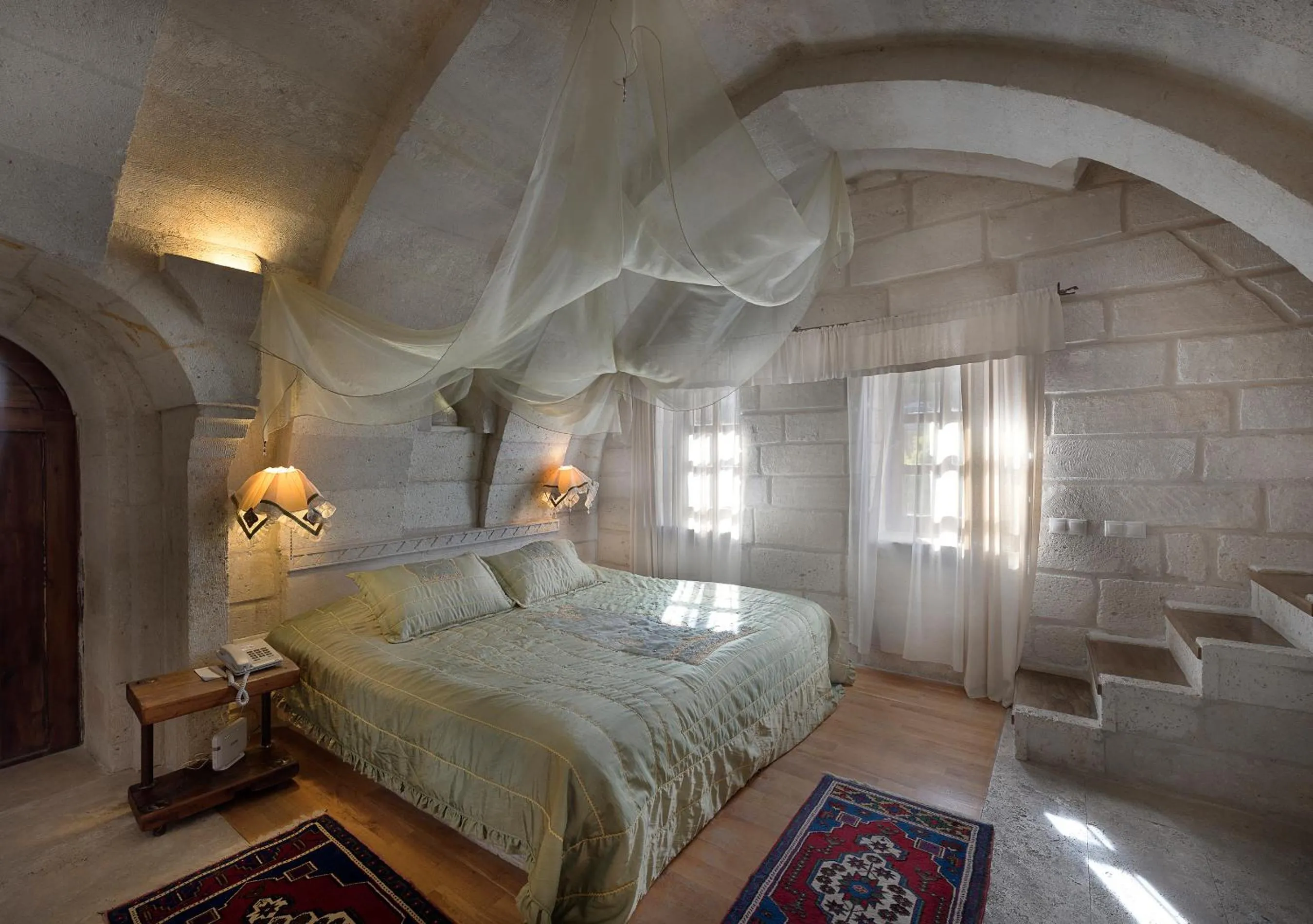Bed in Anatolian Houses Cave Hotel & SPA