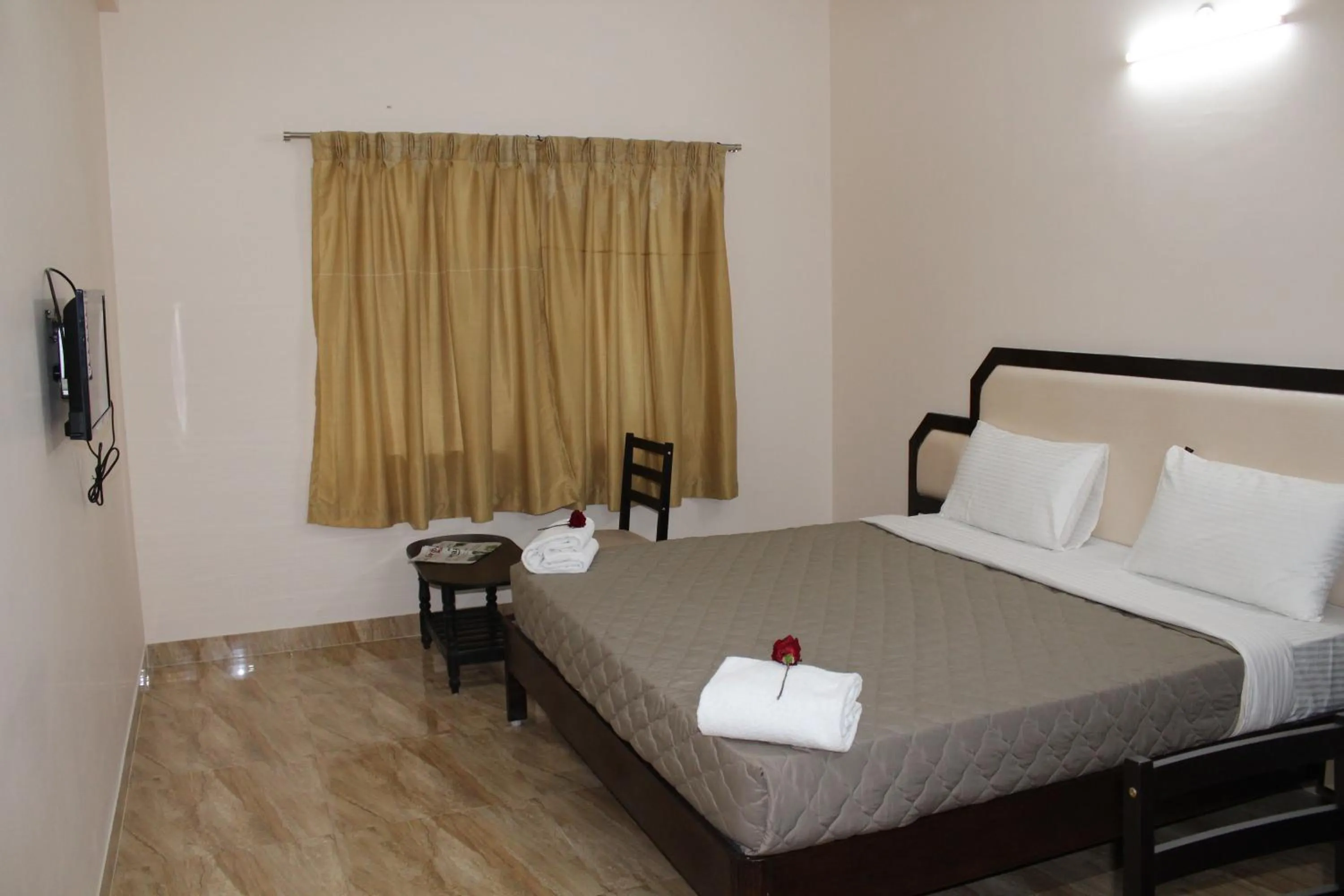 Bed in Hotel Jaidharshini Palace