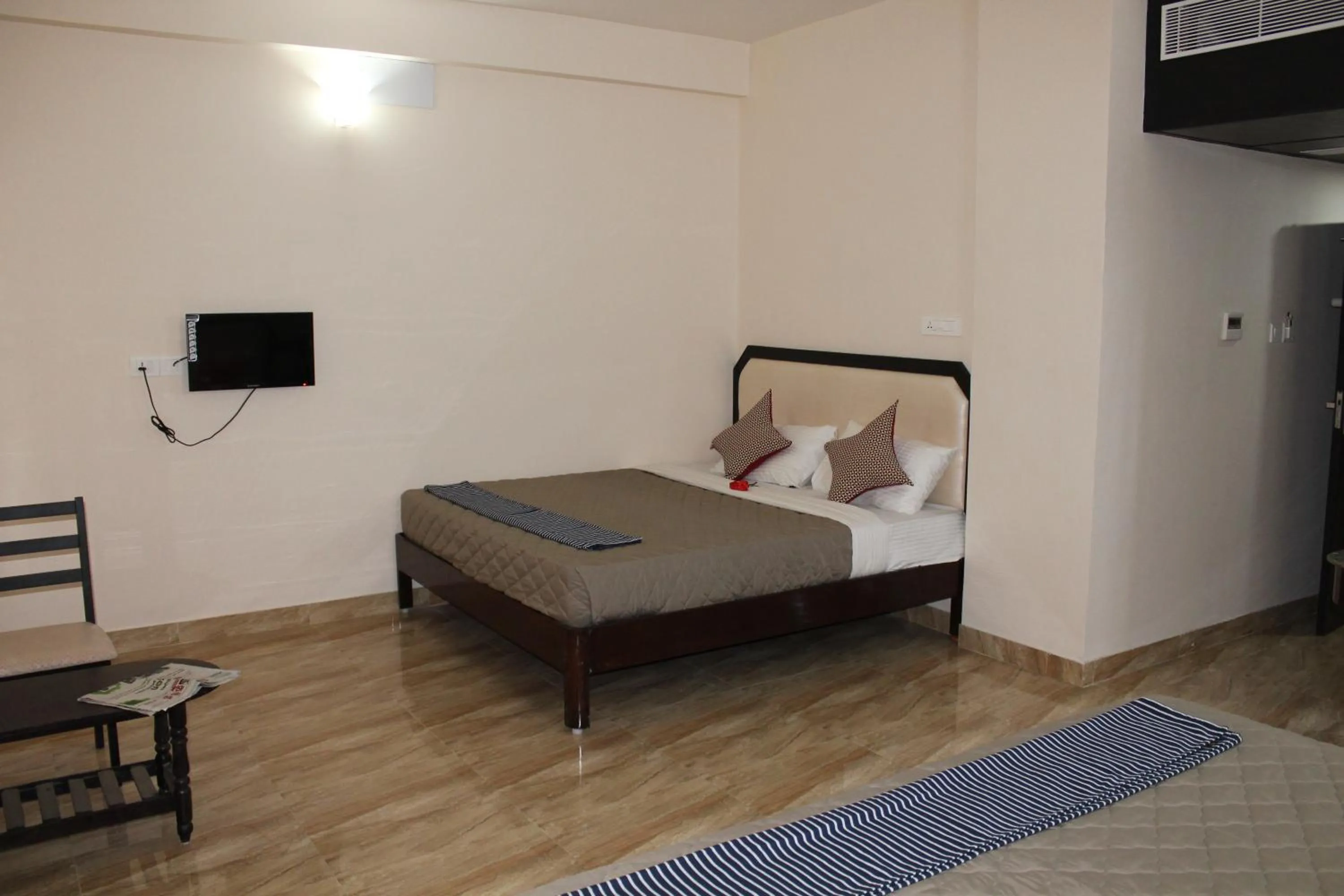 Bed in Hotel Jaidharshini Palace