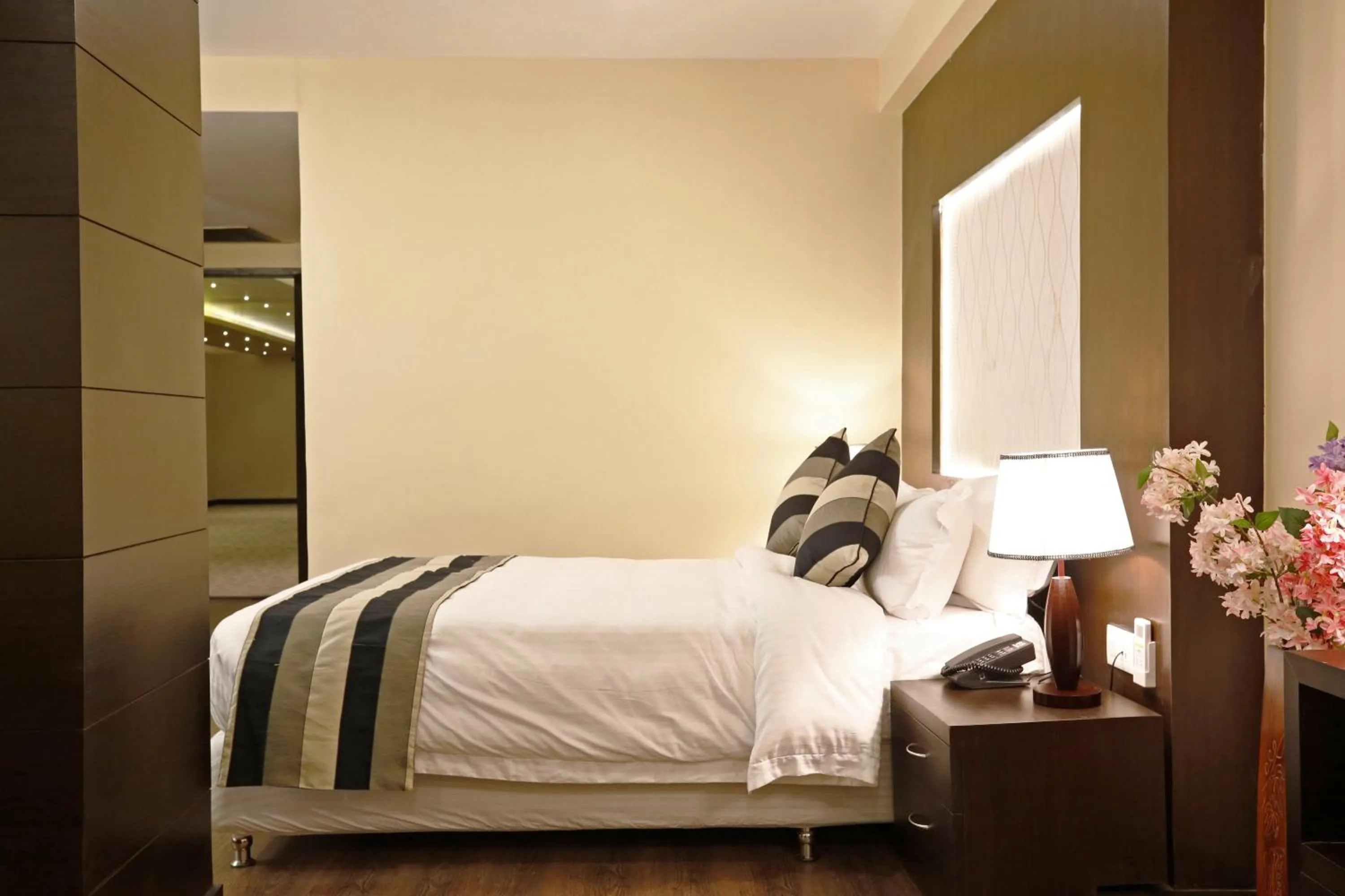 Bed in United Business Hotel