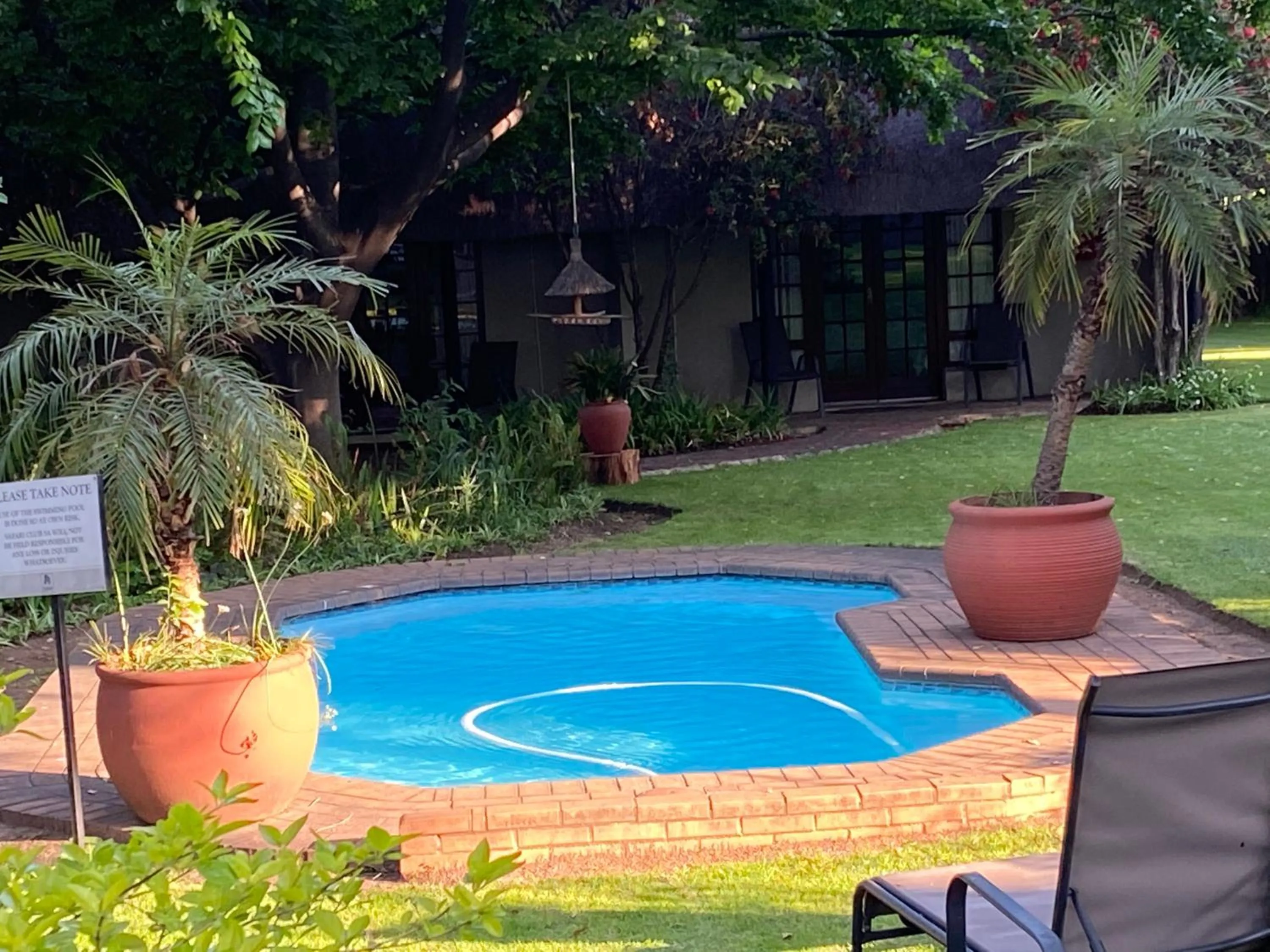 Swimming pool in Safari Club Guest Lodge OR Tambo International Airport
