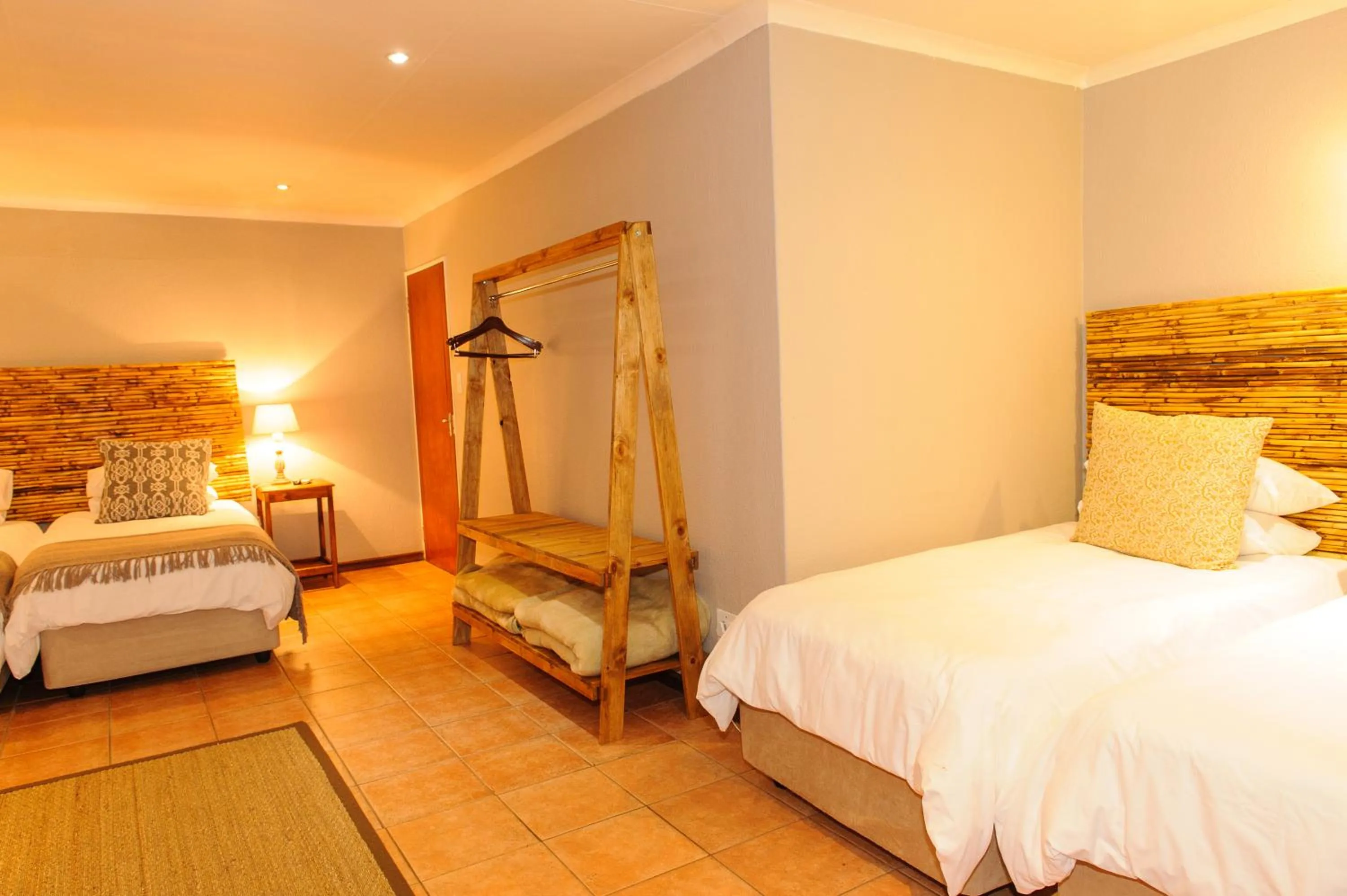 Bed in Safari Club Guest Lodge OR Tambo International Airport