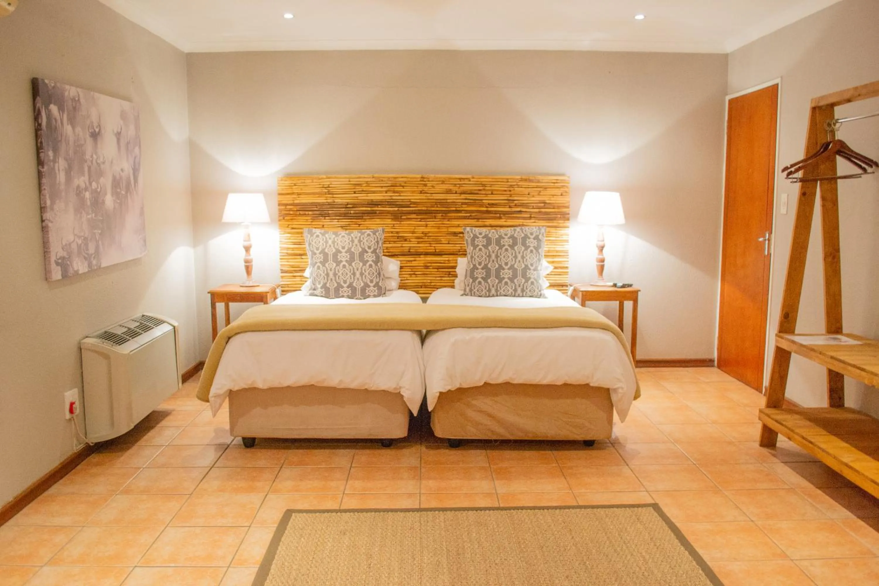 Bed in Safari Club Guest Lodge OR Tambo International Airport