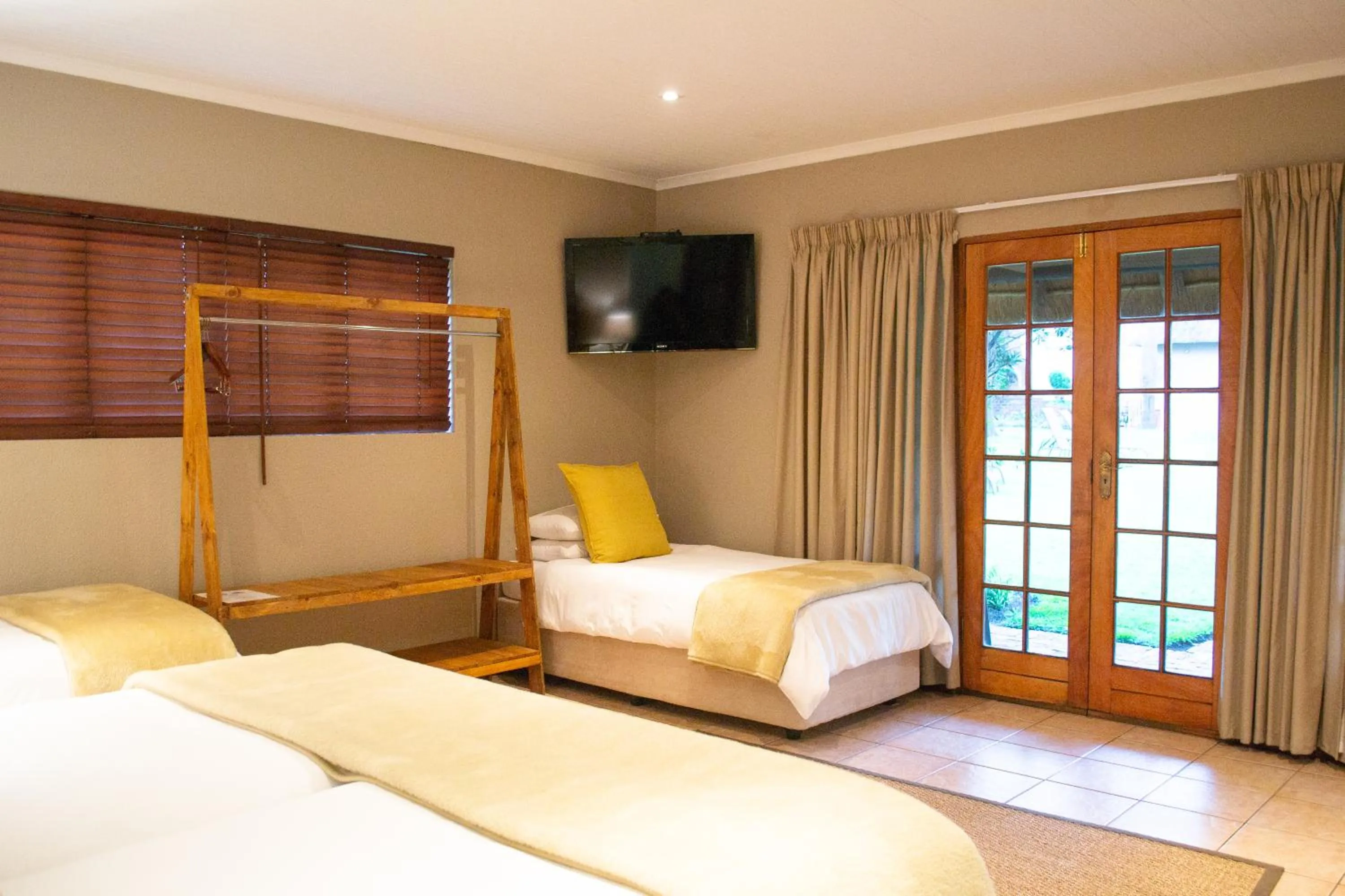 Bed in Safari Club Guest Lodge OR Tambo International Airport