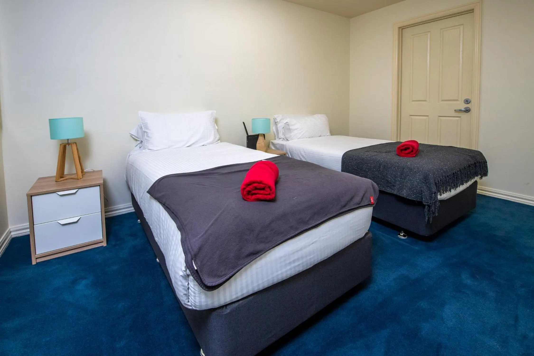 Bedroom, Bed in ReadySet Apartments on King