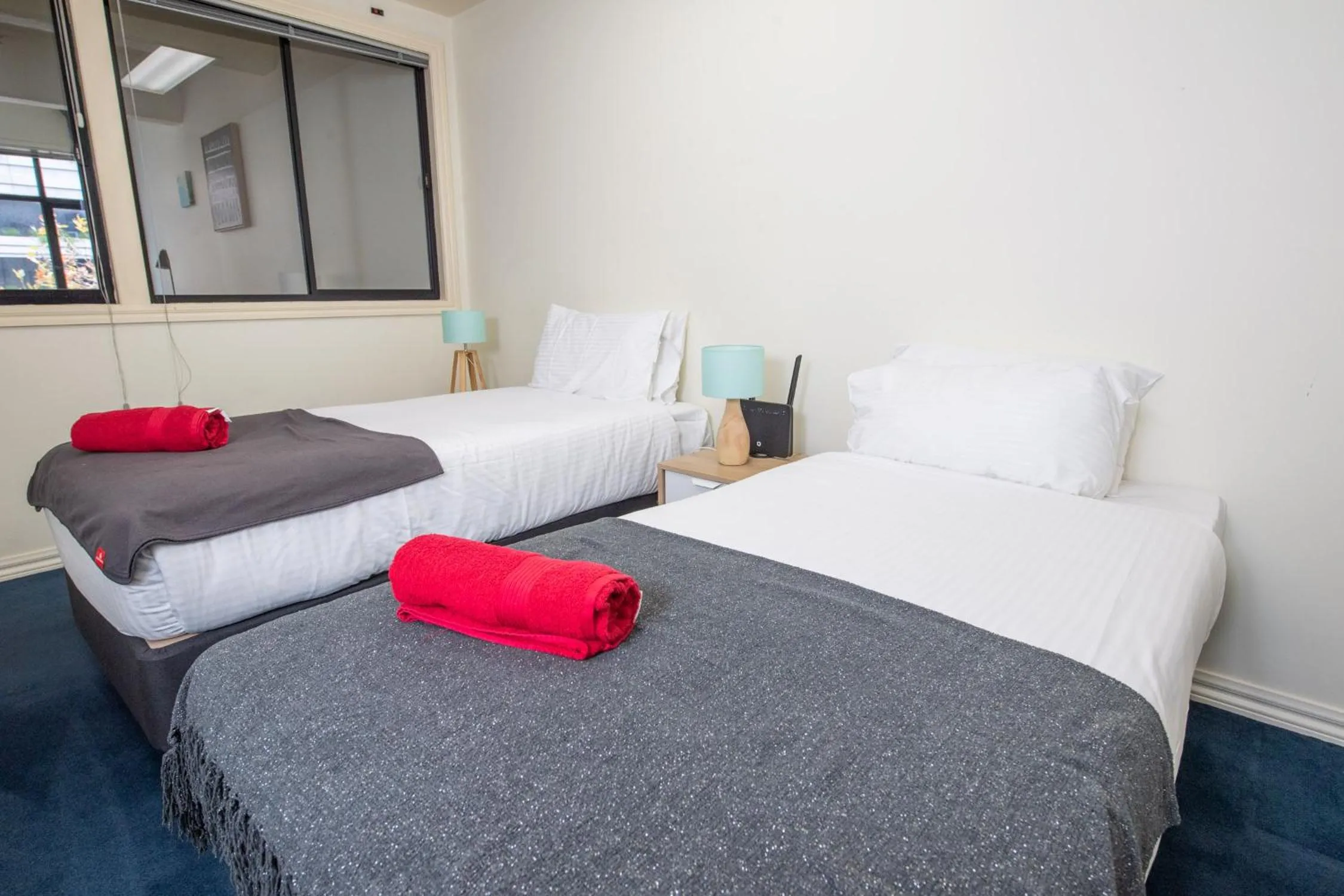 Bedroom, Bed in ReadySet Apartments on King