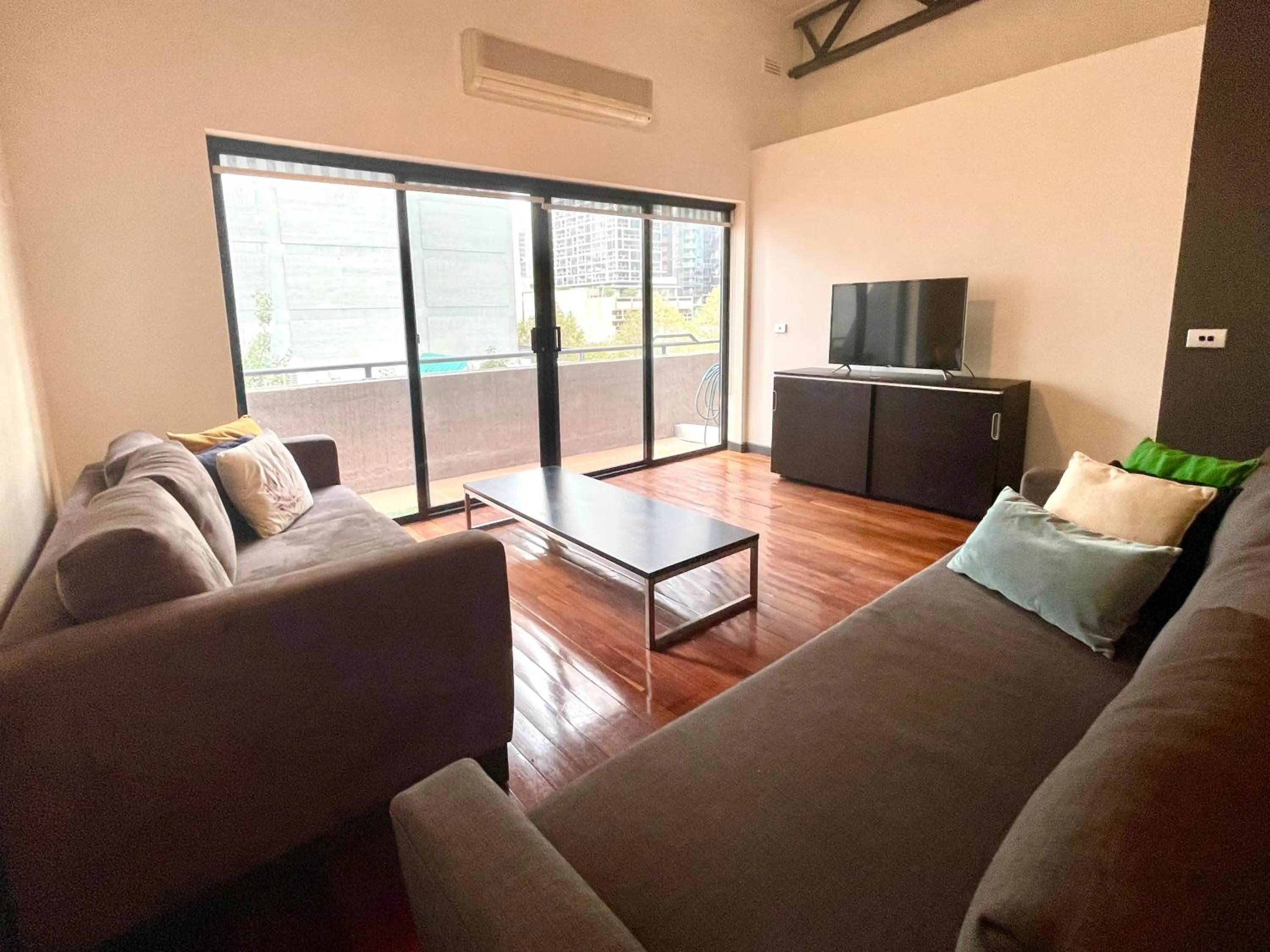 Living room in ReadySet Apartments on King