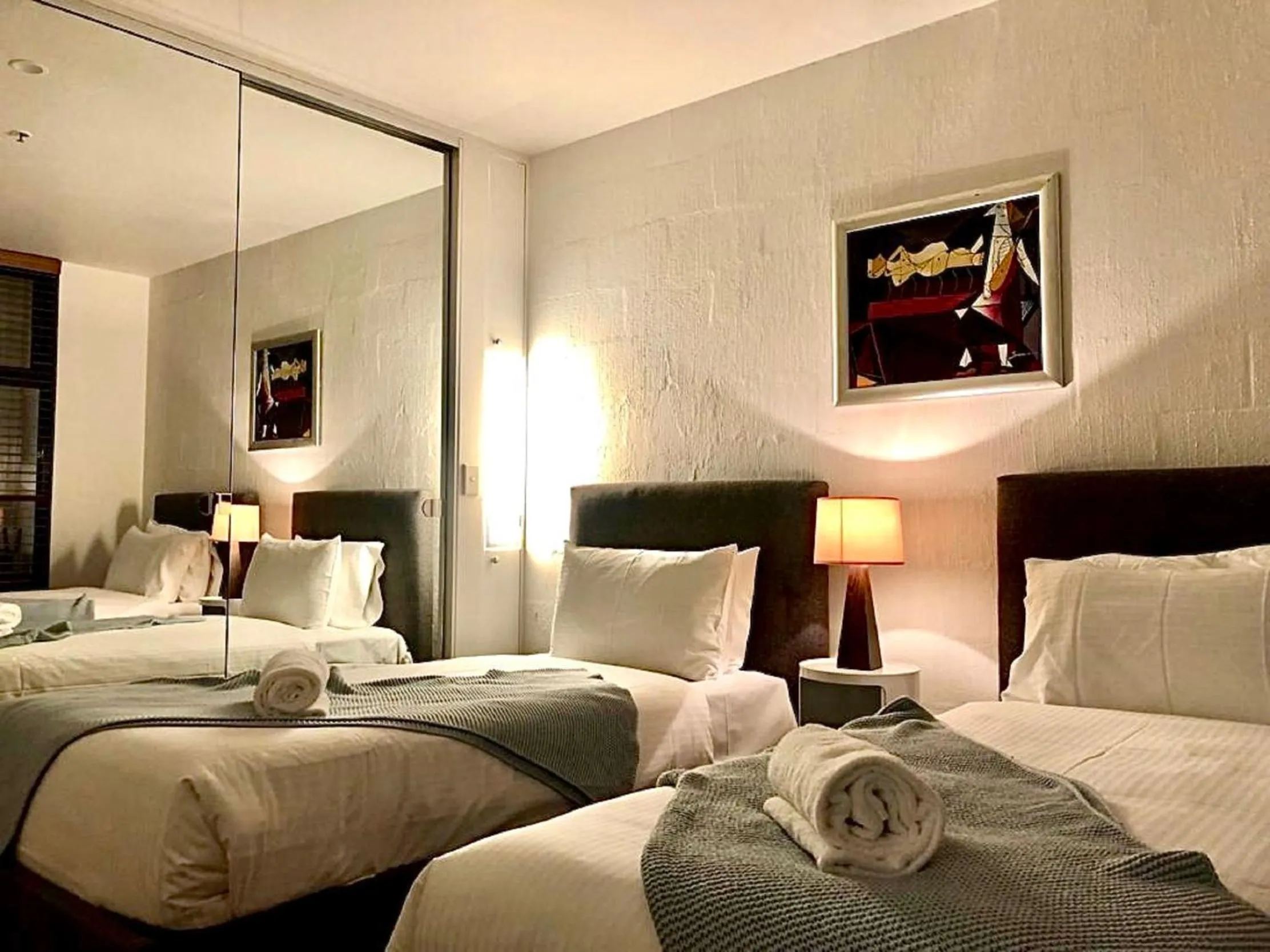 Bed in ReadySet Apartments on King