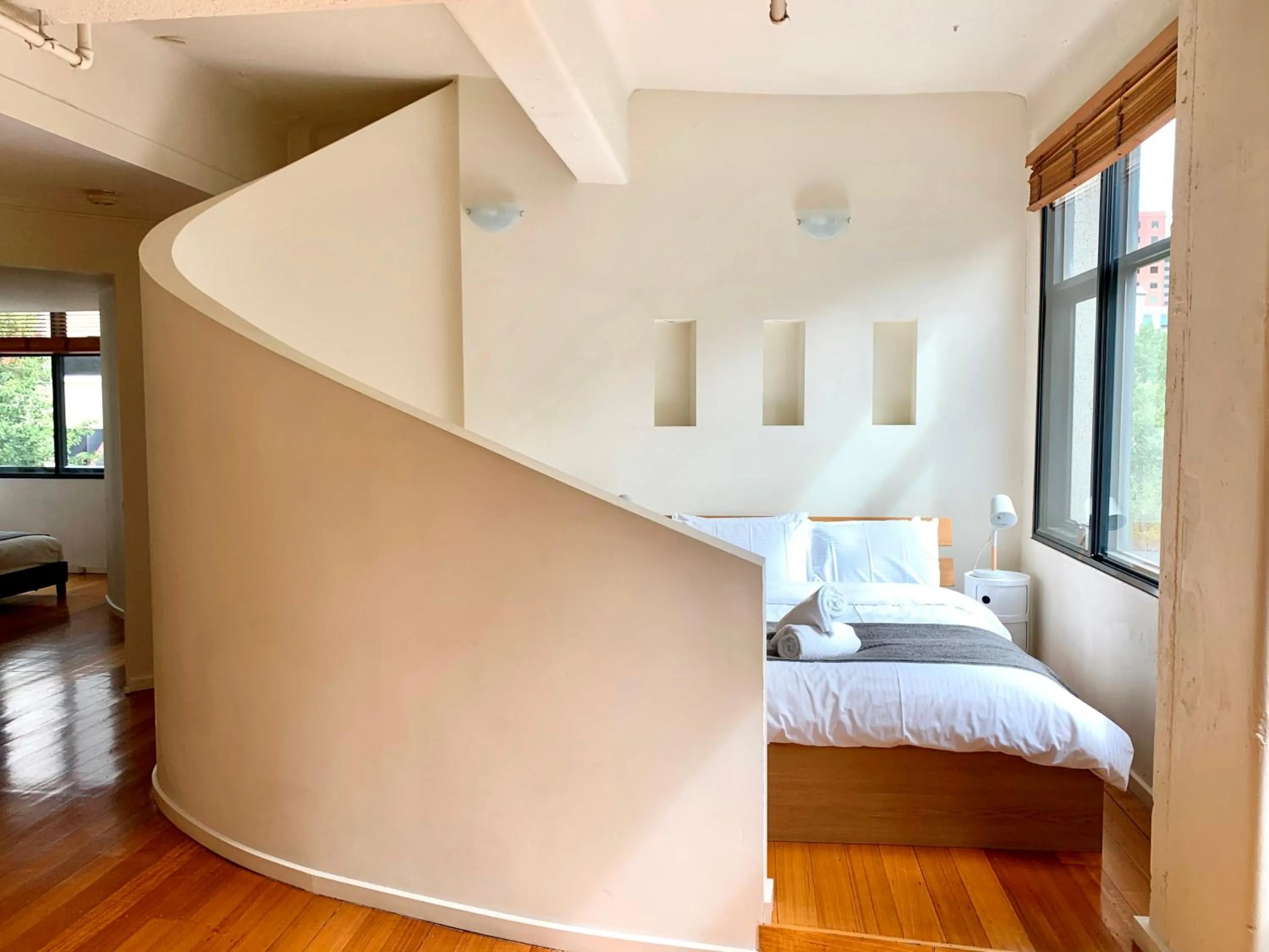 Bed in ReadySet Apartments on King