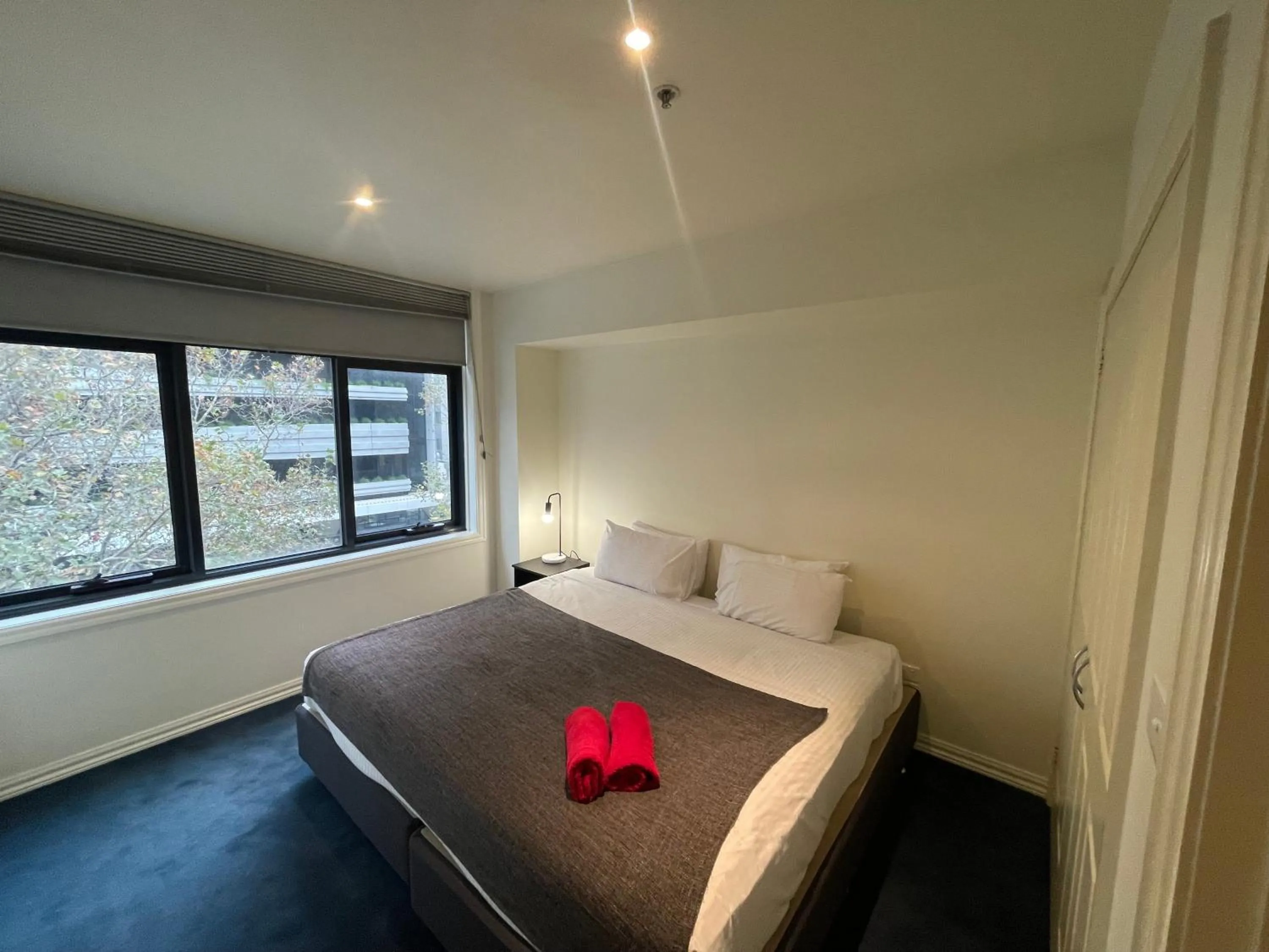 Bed in ReadySet Apartments on King