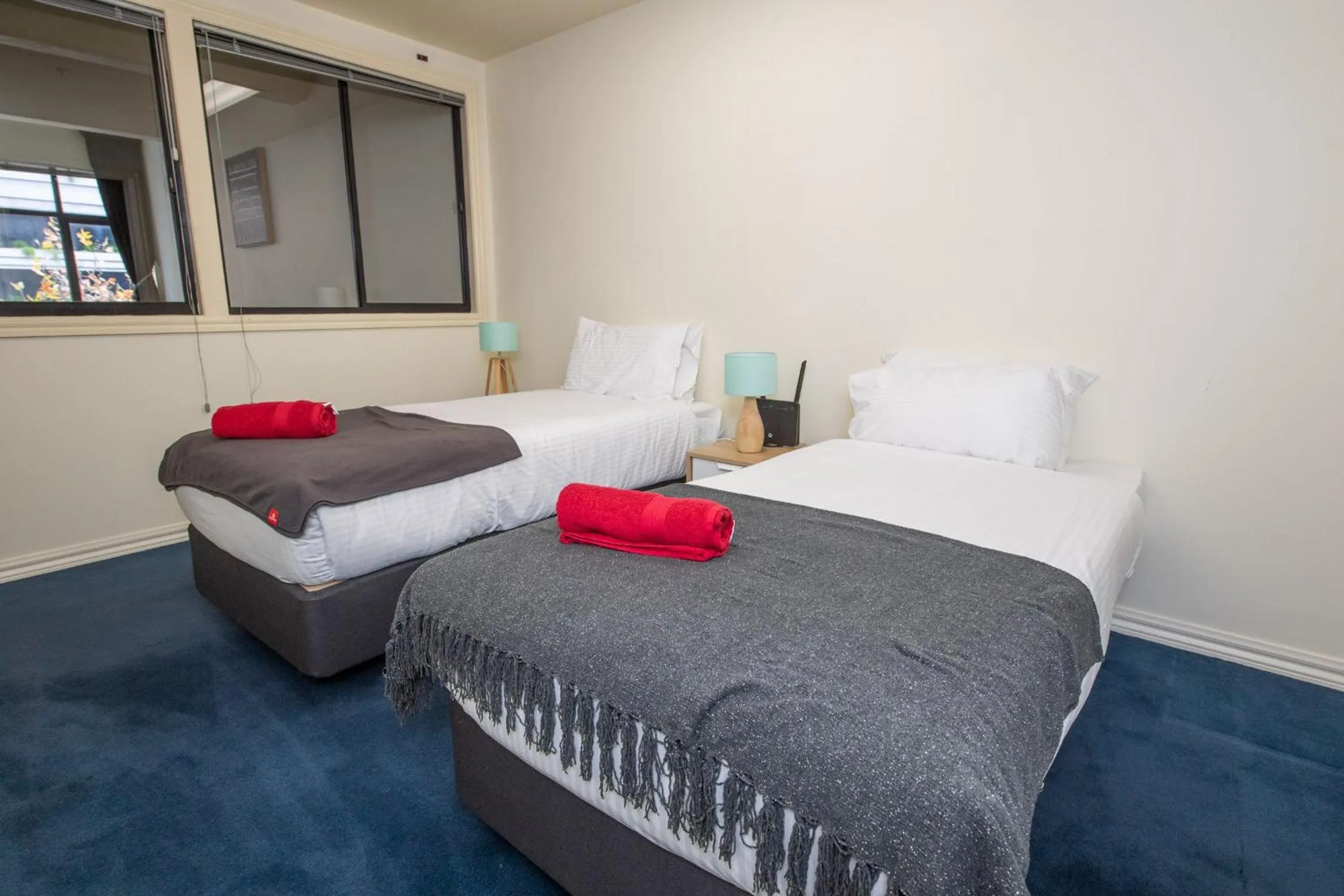 Bedroom, Bed in ReadySet Apartments on King