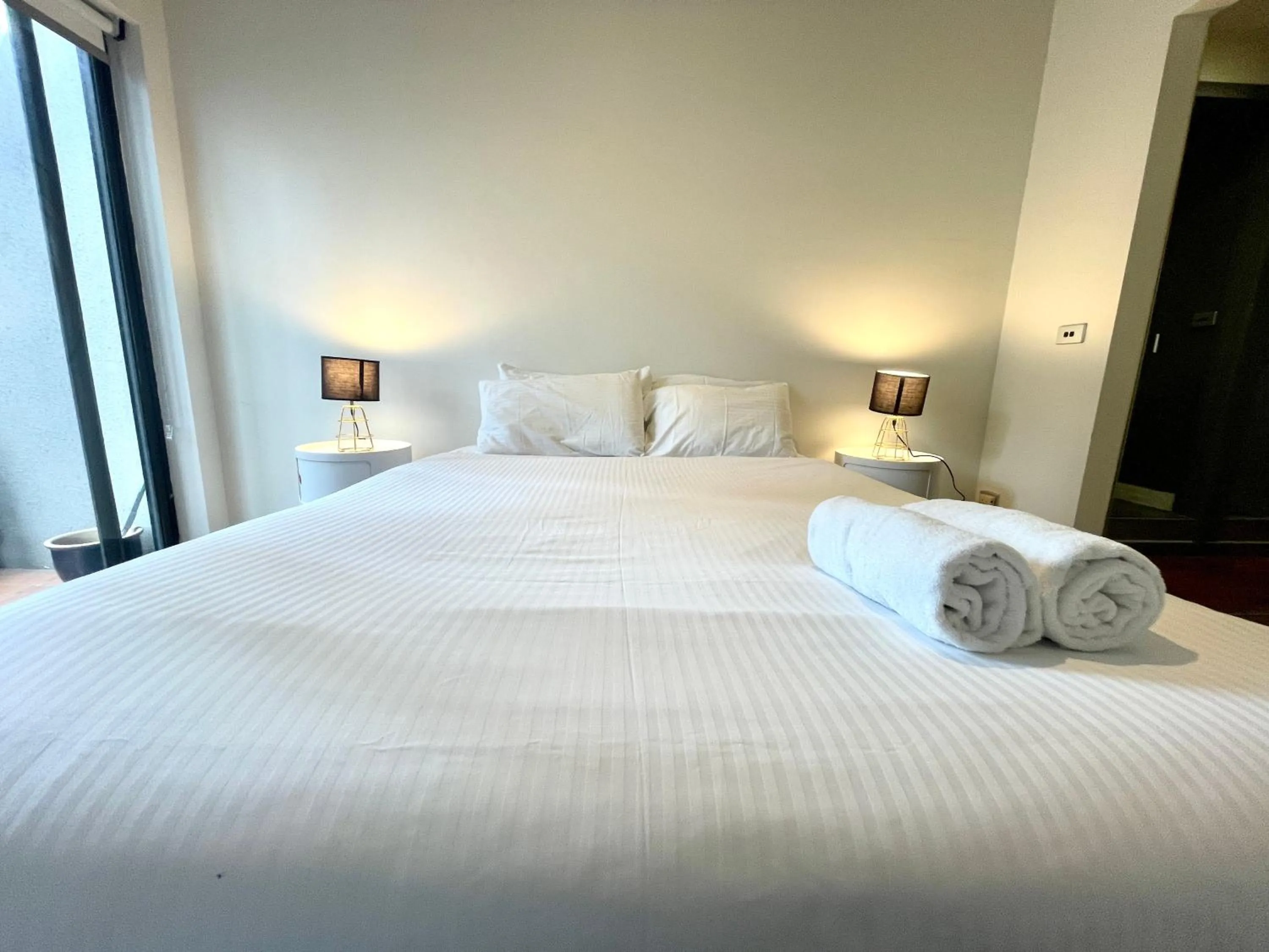 Bed in ReadySet Apartments on King