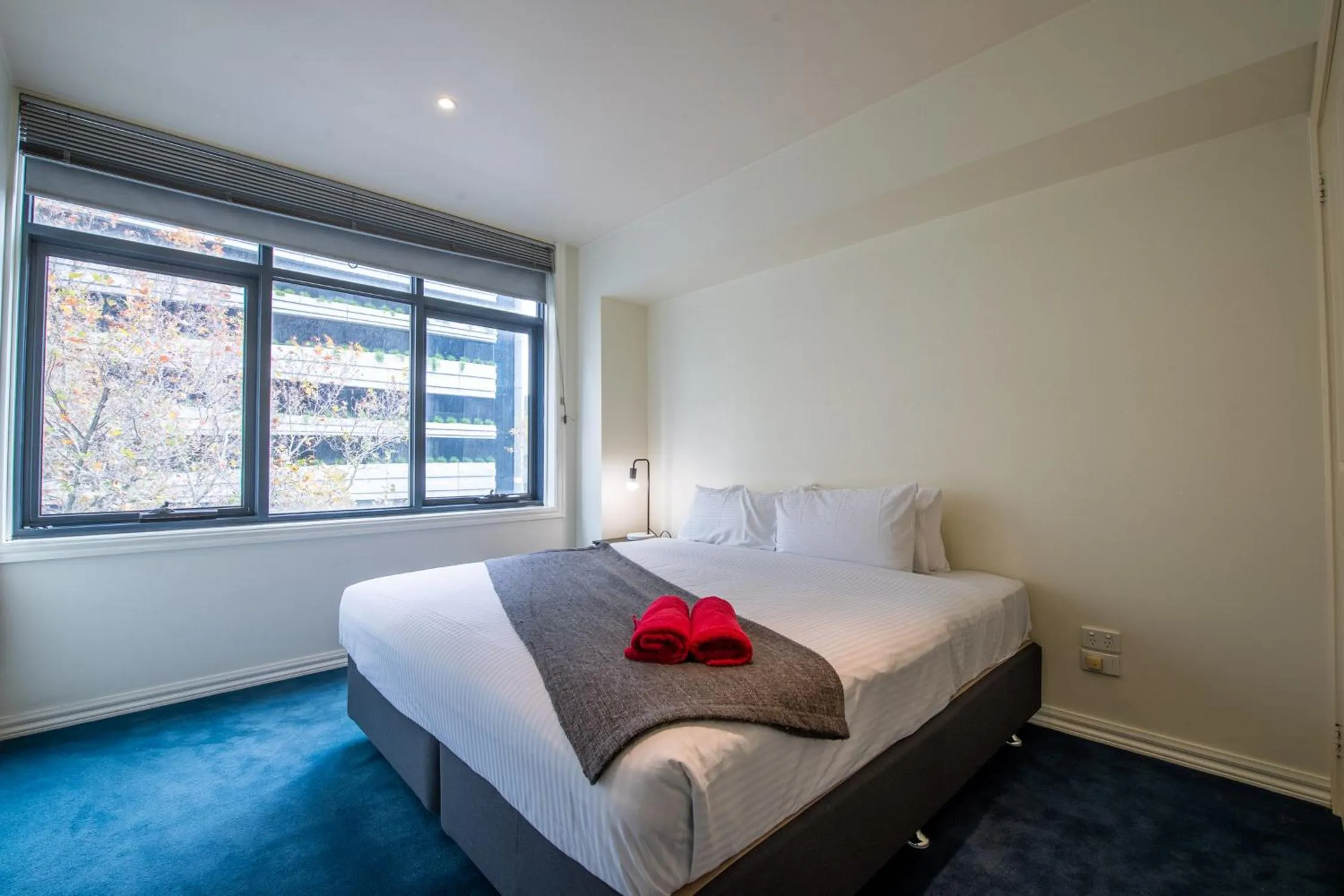 Bed in ReadySet Apartments on King