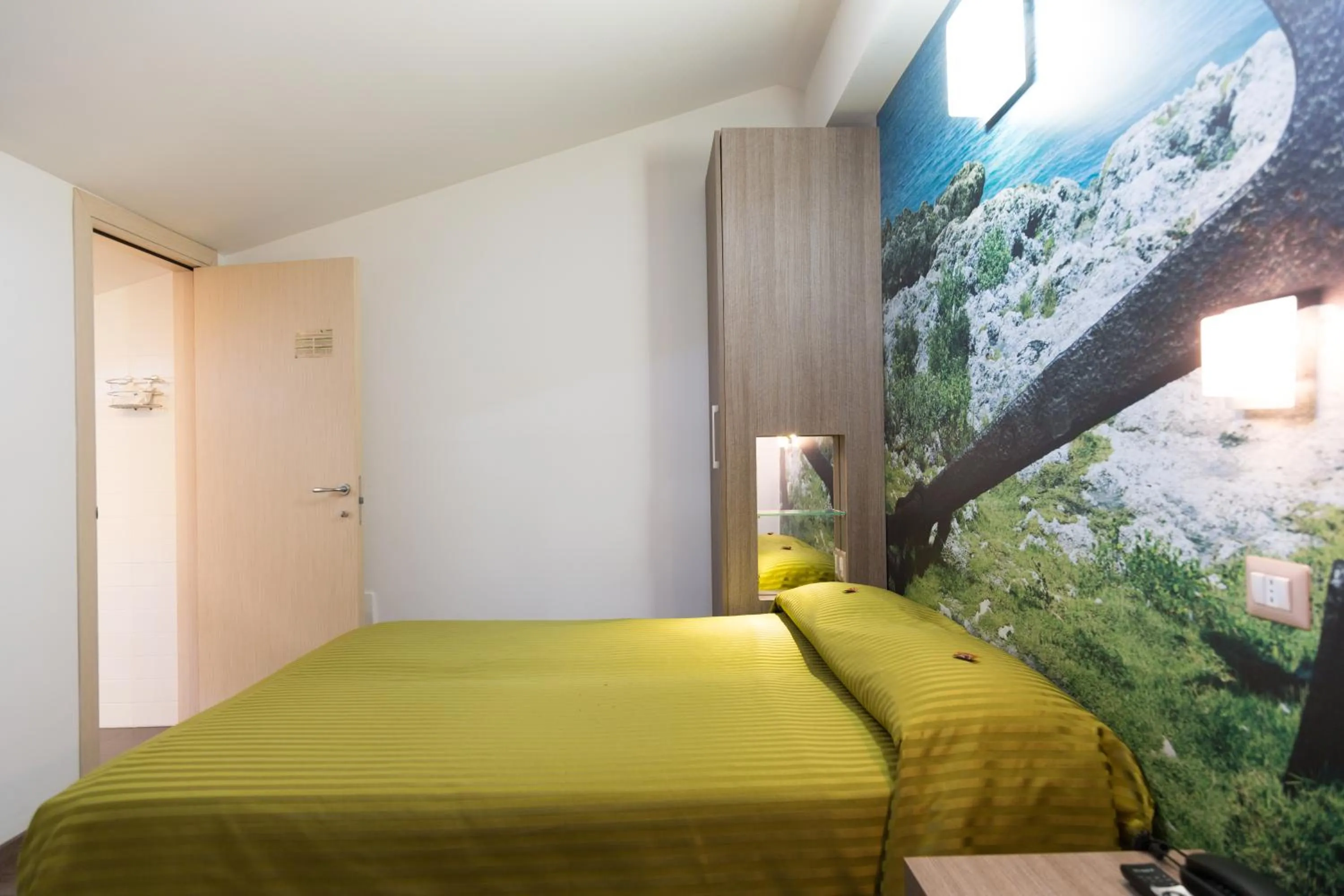 Bed in Hotel Miramare