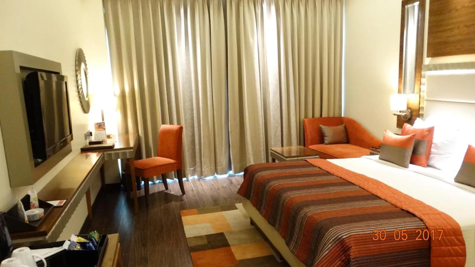 Photo of the whole room, Bed in Ramada Gurgaon Central