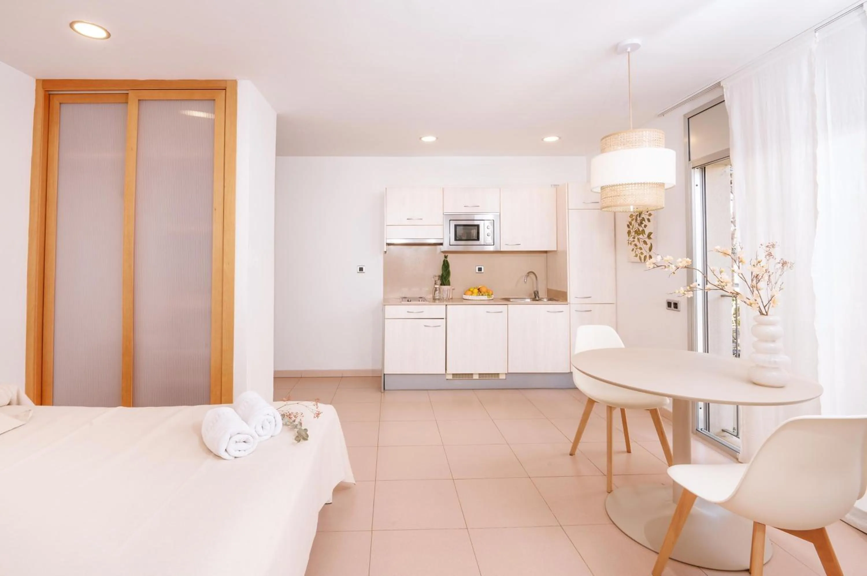 Bed in Apartamentos Porta Coeli