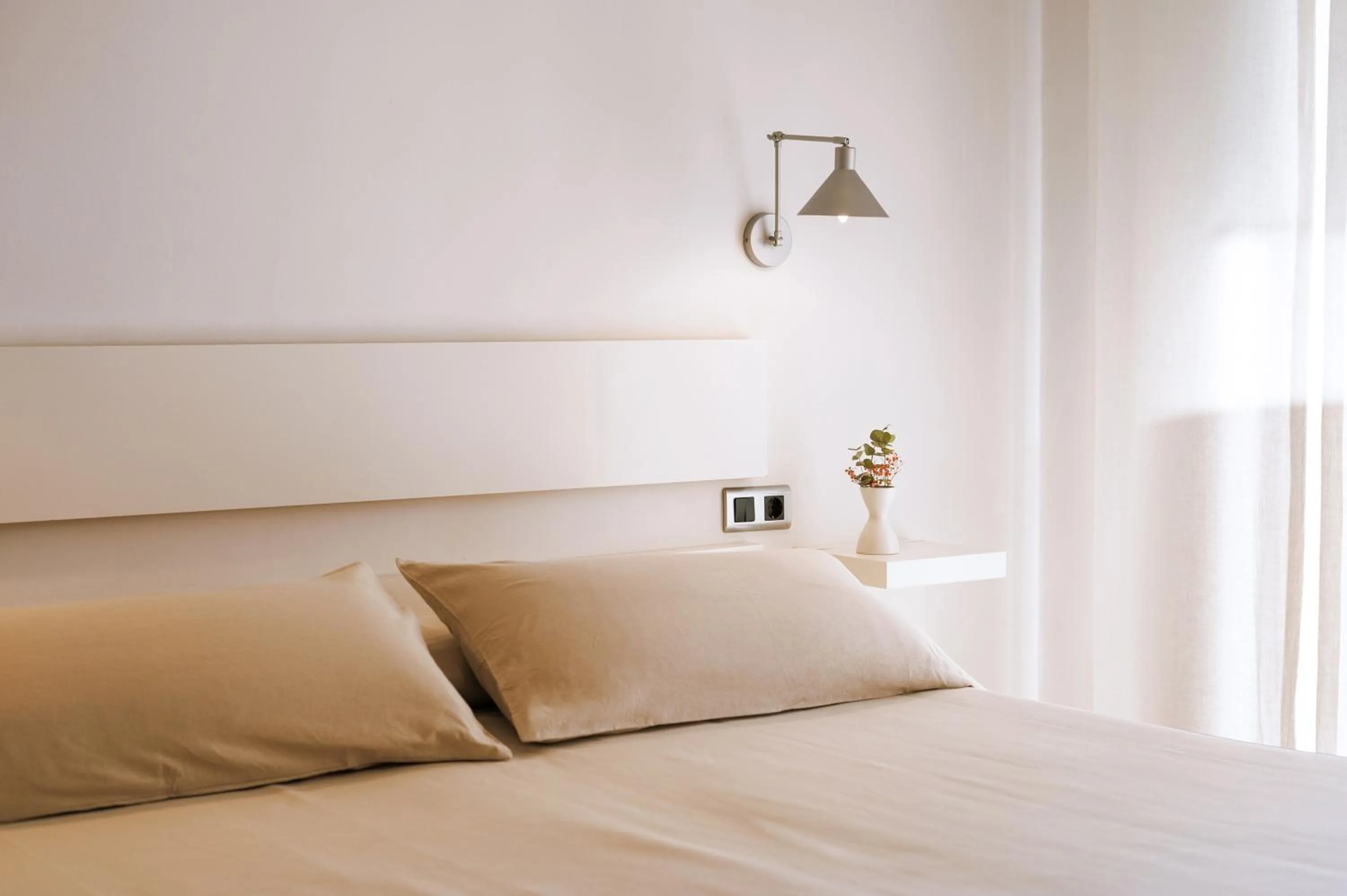 Bed in Apartamentos Porta Coeli