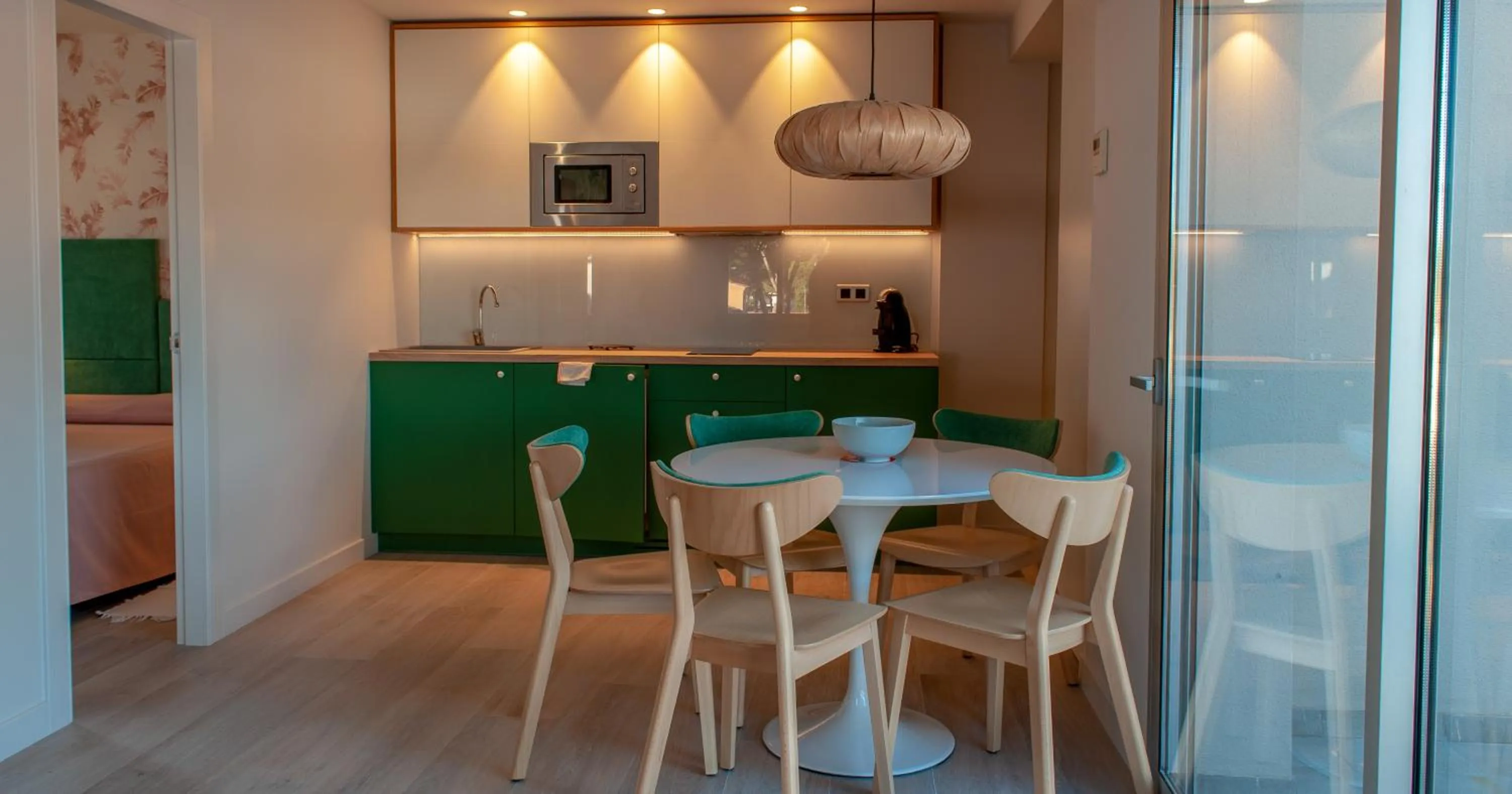 Kitchen or kitchenette in Apartamentos Porta Coeli