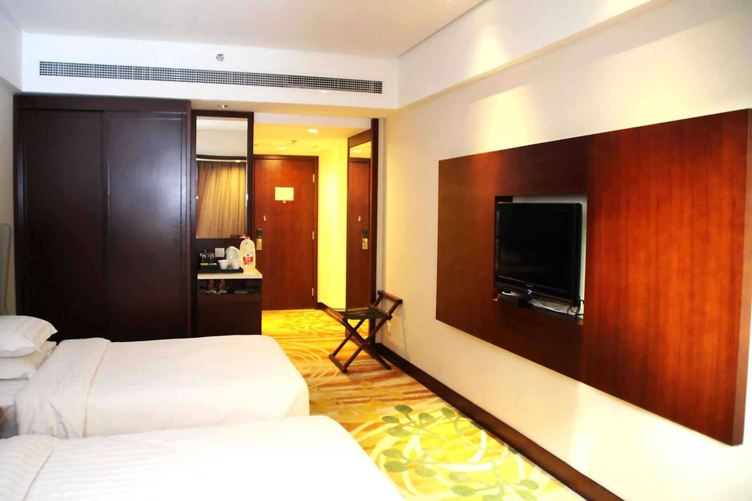 Bed in Ramada by Wyndham Beijing Airport